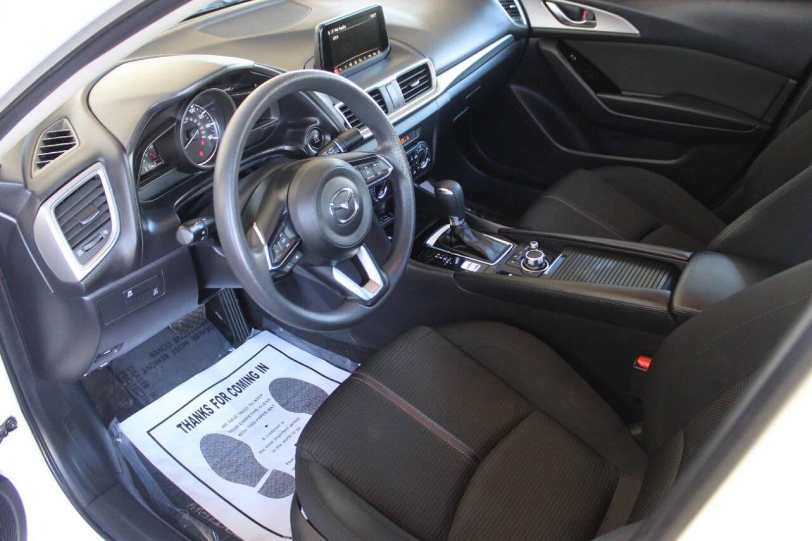 2017 White Mazda MAZDA3 i Sport AT 4-Door (3MZBN1U73HM) with an 2.0L L4 DOHC 16V engine, 6A transmission, located at 4301 NW 39th , Oklahoma City, OK, 73112, (405) 949-5600, 35.512135, -97.598671 - NO DRIVERS LICENCE NO-FULL COVERAGE INSURANCE-NO CREDIT CHECK. COME ON OVER TO SUPERSPORTS AND TAKE A LOOK AND TEST DRIVE. PLEASE GIVE US A CALL AT (405) 949-5600. NO LICENSIA DE MANEJAR- NO SEGURO DE COBERTURA TOTAL- NO VERIFICACCION DE CREDITO. POR FAVOR VENGAN A SUPERSPORTS, ECHE UN - Photo#15