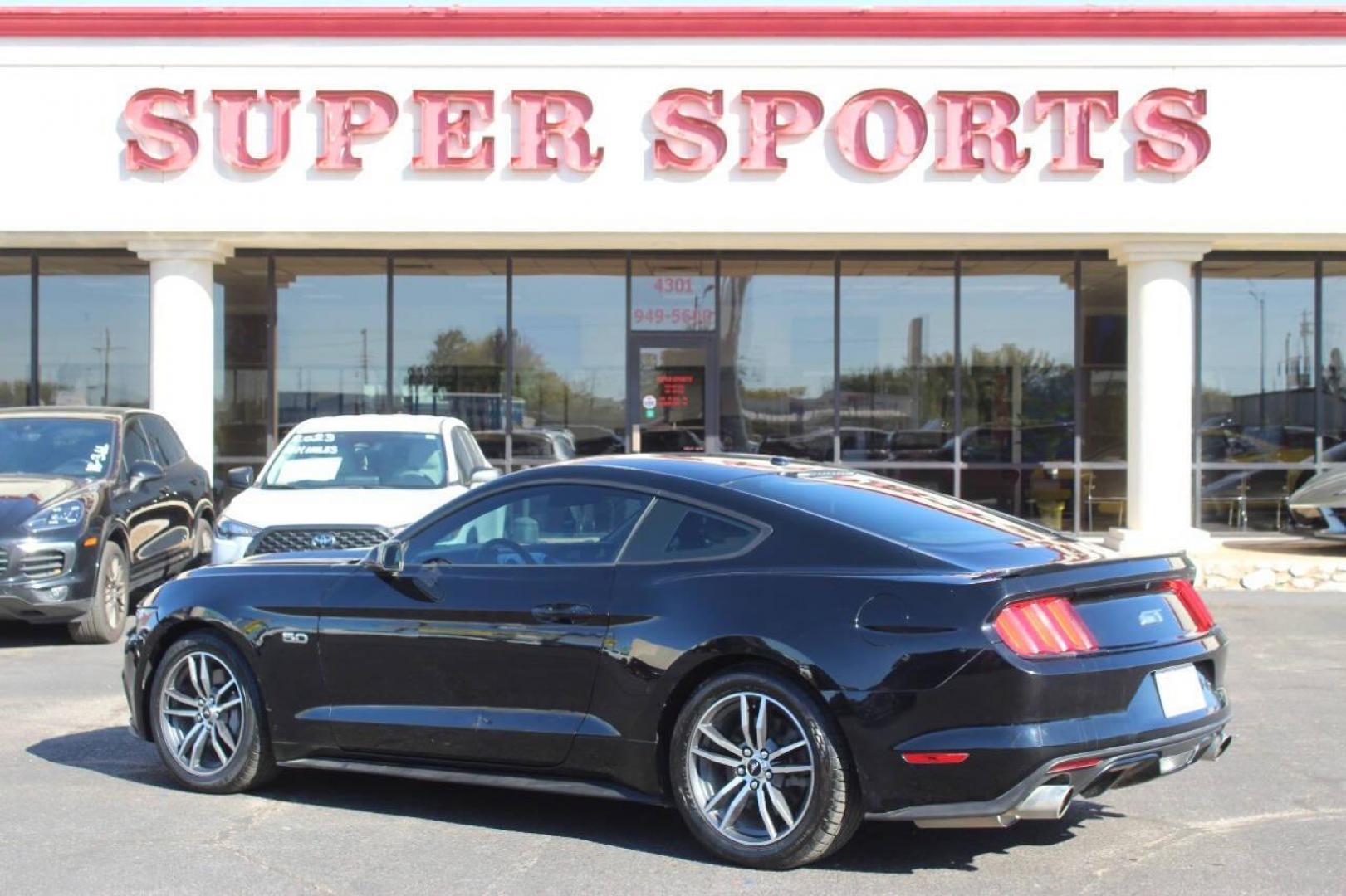 2015 Black Ford Mustang GT Coupe (1FA6P8CF8F5) with an 5.0L V8 DOHC 32V engine, Automatic 6-Speed transmission, located at 4301 NW 39th , Oklahoma City, OK, 73112, (405) 949-5600, 35.512135, -97.598671 - NO DRIVERS LICENCE NO-FULL COVERAGE INSURANCE-NO CREDIT CHECK. COME ON OVER TO SUPERSPORTS AND TAKE A LOOK AND TEST DRIVE. PLEASE GIVE US A CALL AT (405) 949-5600. NO LICENSIA DE MANEJAR- NO SEGURO DE COBERTURA TOTAL- NO VERIFICACCION DE CREDITO. POR FAVOR VENGAN A SUPERSPORTS, ECHE UN - Photo#4