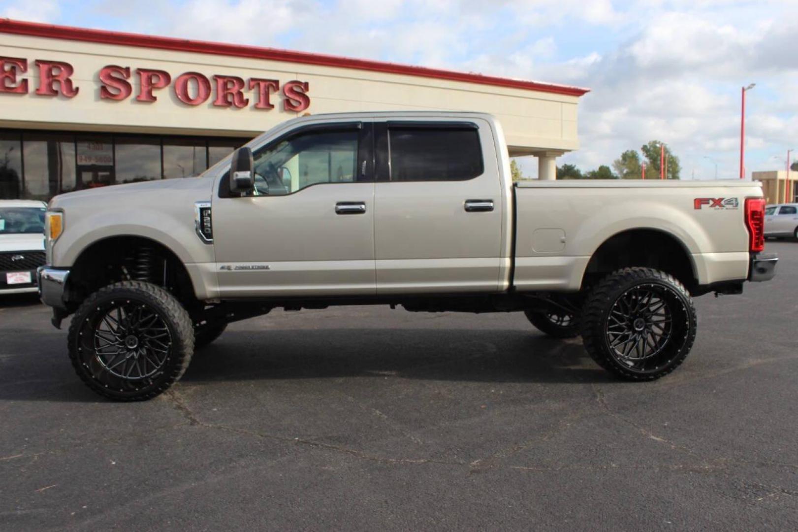 2017 Gold Ford F-250 SD King Ranch Crew Cab Long Bed 4WD (1FT7W2BT7HE) with an 6.7L V8 OHV 16V DIESEL engine, 6A transmission, located at 4301 NW 39th , Oklahoma City, OK, 73112, (405) 949-5600, 35.512135, -97.598671 - NO DRIVERS LICENCE NO-FULL COVERAGE INSURANCE-NO CREDIT CHECK. COME ON OVER TO SUPERSPORTS AND TAKE A LOOK AND TEST DRIVE. PLEASE GIVE US A CALL AT (405) 949-5600. NO LICENSIA DE MANEJAR- NO SEGURO DE COBERTURA TOTAL- NO VERIFICACCION DE CREDITO. POR FAVOR VENGAN A SUPERSPORTS, ECHE UN - Photo#5