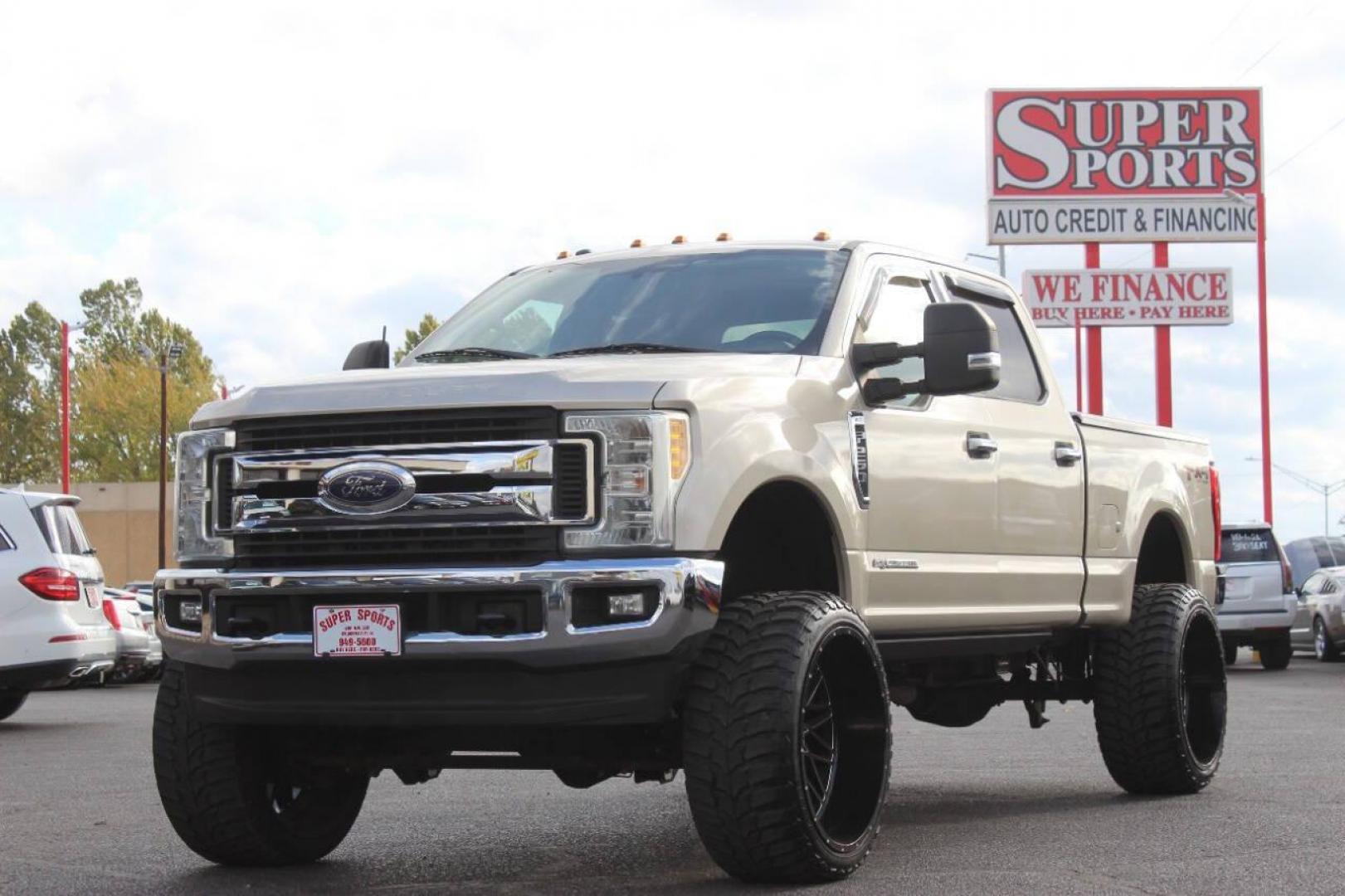 2017 Gold Ford F-250 SD King Ranch Crew Cab Long Bed 4WD (1FT7W2BT7HE) with an 6.7L V8 OHV 16V DIESEL engine, 6A transmission, located at 4301 NW 39th , Oklahoma City, OK, 73112, (405) 949-5600, 35.512135, -97.598671 - NO DRIVERS LICENCE NO-FULL COVERAGE INSURANCE-NO CREDIT CHECK. COME ON OVER TO SUPERSPORTS AND TAKE A LOOK AND TEST DRIVE. PLEASE GIVE US A CALL AT (405) 949-5600. NO LICENSIA DE MANEJAR- NO SEGURO DE COBERTURA TOTAL- NO VERIFICACCION DE CREDITO. POR FAVOR VENGAN A SUPERSPORTS, ECHE UN - Photo#6