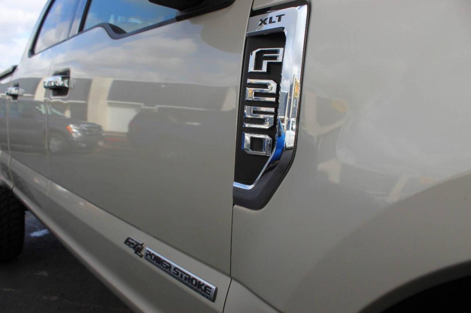 2017 Gold Ford F-250 SD King Ranch Crew Cab Long Bed 4WD (1FT7W2BT7HE) with an 6.7L V8 OHV 16V DIESEL engine, 6A transmission, located at 4301 NW 39th , Oklahoma City, OK, 73112, (405) 949-5600, 35.512135, -97.598671 - NO DRIVERS LICENCE NO-FULL COVERAGE INSURANCE-NO CREDIT CHECK. COME ON OVER TO SUPERSPORTS AND TAKE A LOOK AND TEST DRIVE. PLEASE GIVE US A CALL AT (405) 949-5600. NO LICENSIA DE MANEJAR- NO SEGURO DE COBERTURA TOTAL- NO VERIFICACCION DE CREDITO. POR FAVOR VENGAN A SUPERSPORTS, ECHE UN - Photo#7
