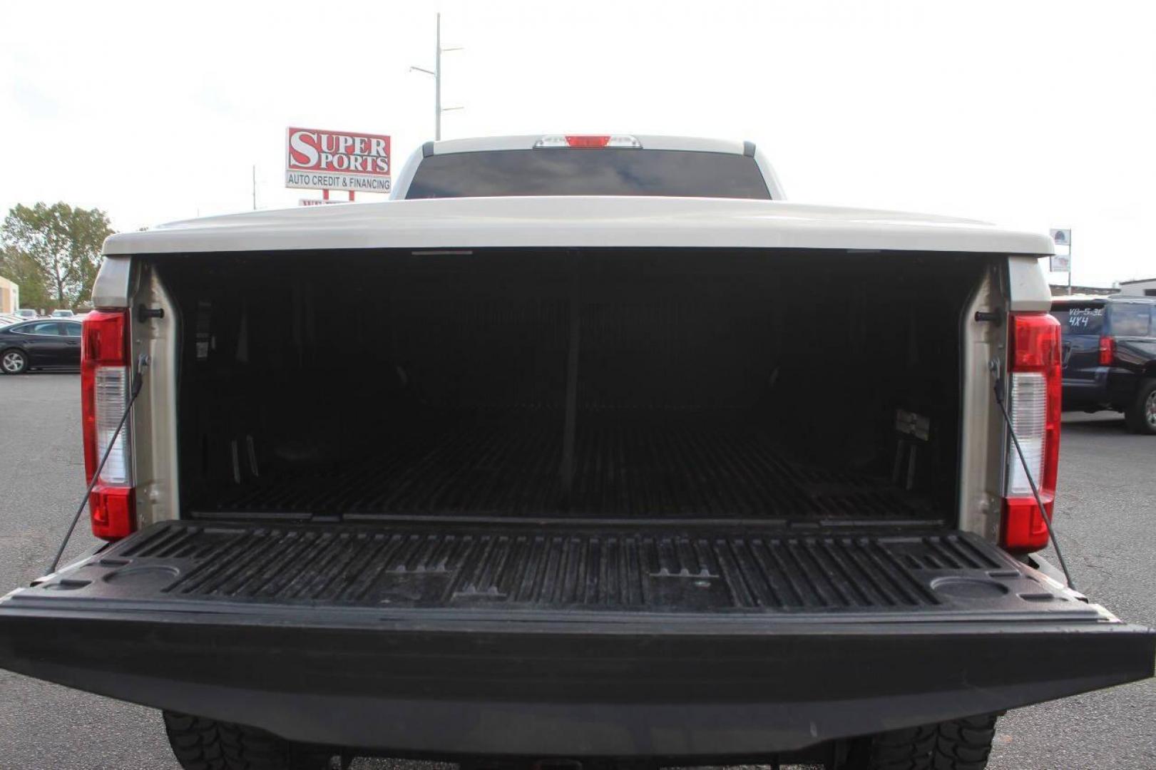 2017 Gold Ford F-250 SD King Ranch Crew Cab Long Bed 4WD (1FT7W2BT7HE) with an 6.7L V8 OHV 16V DIESEL engine, 6A transmission, located at 4301 NW 39th , Oklahoma City, OK, 73112, (405) 949-5600, 35.512135, -97.598671 - NO DRIVERS LICENCE NO-FULL COVERAGE INSURANCE-NO CREDIT CHECK. COME ON OVER TO SUPERSPORTS AND TAKE A LOOK AND TEST DRIVE. PLEASE GIVE US A CALL AT (405) 949-5600. NO LICENSIA DE MANEJAR- NO SEGURO DE COBERTURA TOTAL- NO VERIFICACCION DE CREDITO. POR FAVOR VENGAN A SUPERSPORTS, ECHE UN - Photo#14