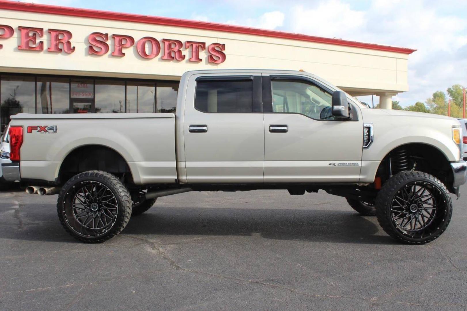 2017 Gold Ford F-250 SD King Ranch Crew Cab Long Bed 4WD (1FT7W2BT7HE) with an 6.7L V8 OHV 16V DIESEL engine, 6A transmission, located at 4301 NW 39th , Oklahoma City, OK, 73112, (405) 949-5600, 35.512135, -97.598671 - NO DRIVERS LICENCE NO-FULL COVERAGE INSURANCE-NO CREDIT CHECK. COME ON OVER TO SUPERSPORTS AND TAKE A LOOK AND TEST DRIVE. PLEASE GIVE US A CALL AT (405) 949-5600. NO LICENSIA DE MANEJAR- NO SEGURO DE COBERTURA TOTAL- NO VERIFICACCION DE CREDITO. POR FAVOR VENGAN A SUPERSPORTS, ECHE UN - Photo#2