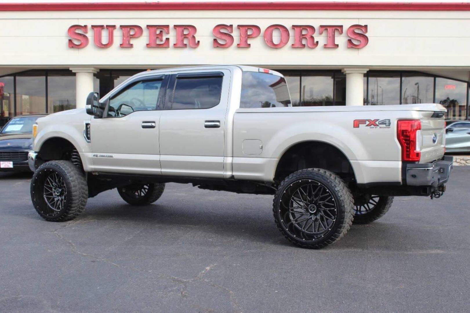 2017 Gold Ford F-250 SD King Ranch Crew Cab Long Bed 4WD (1FT7W2BT7HE) with an 6.7L V8 OHV 16V DIESEL engine, 6A transmission, located at 4301 NW 39th , Oklahoma City, OK, 73112, (405) 949-5600, 35.512135, -97.598671 - NO DRIVERS LICENCE NO-FULL COVERAGE INSURANCE-NO CREDIT CHECK. COME ON OVER TO SUPERSPORTS AND TAKE A LOOK AND TEST DRIVE. PLEASE GIVE US A CALL AT (405) 949-5600. NO LICENSIA DE MANEJAR- NO SEGURO DE COBERTURA TOTAL- NO VERIFICACCION DE CREDITO. POR FAVOR VENGAN A SUPERSPORTS, ECHE UN - Photo#4