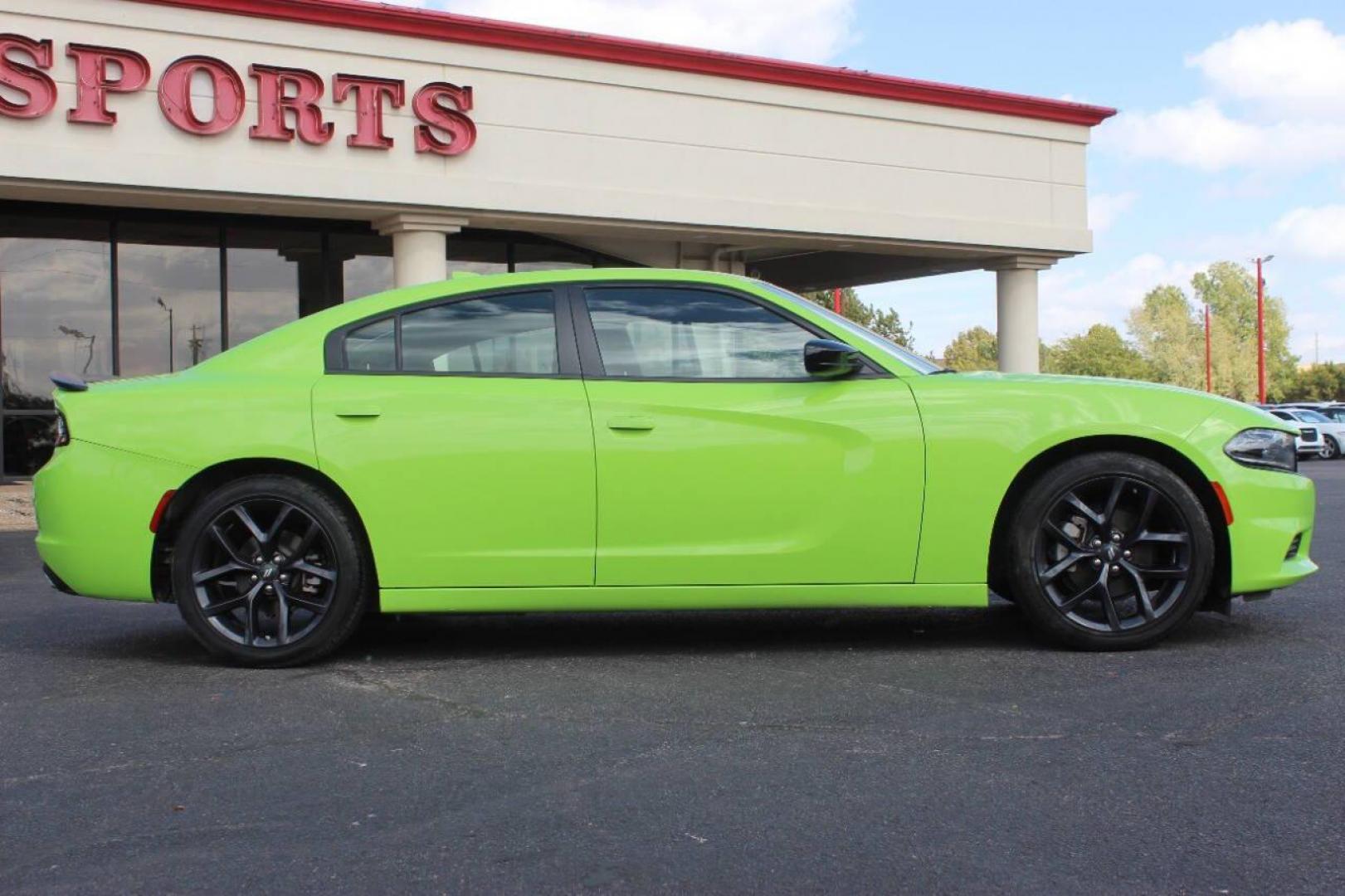 2023 Lime Green Dodge Charger SXT (2C3CDXBG6PH) with an 3.6L V6 DOHC 24V engine, 8A transmission, located at 4301 NW 39th , Oklahoma City, OK, 73112, (405) 949-5600, 35.512135, -97.598671 - NO DRIVERS LICENCE NO-FULL COVERAGE INSURANCE-NO CREDIT CHECK. COME ON OVER TO SUPERSPORTS AND TAKE A LOOK AND TEST DRIVE. PLEASE GIVE US A CALL AT (405) 949-5600. NO LICENSIA DE MANEJAR- NO SEGURO DE COBERTURA TOTAL- NO VERIFICACCION DE CREDITO. POR FAVOR VENGAN A SUPERSPORTS, ECHE UN - Photo#3