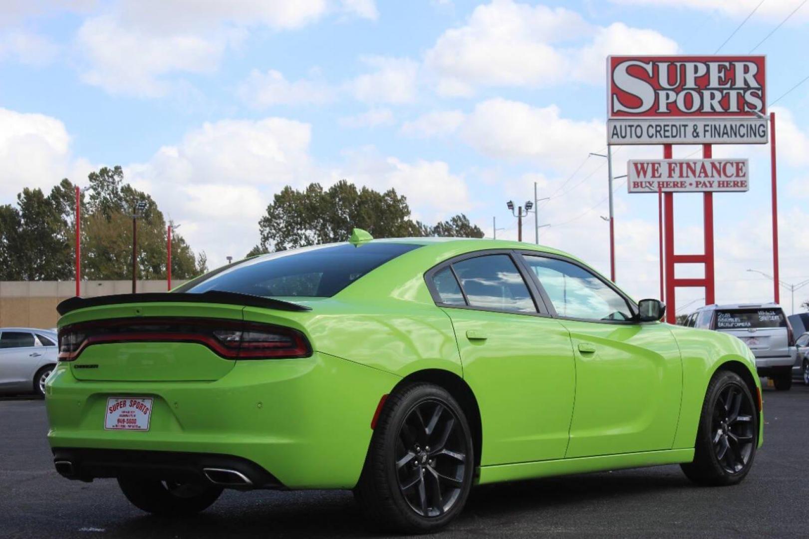 2023 Lime Green Dodge Charger SXT (2C3CDXBG6PH) with an 3.6L V6 DOHC 24V engine, 8A transmission, located at 4301 NW 39th , Oklahoma City, OK, 73112, (405) 949-5600, 35.512135, -97.598671 - NO DRIVERS LICENCE NO-FULL COVERAGE INSURANCE-NO CREDIT CHECK. COME ON OVER TO SUPERSPORTS AND TAKE A LOOK AND TEST DRIVE. PLEASE GIVE US A CALL AT (405) 949-5600. NO LICENSIA DE MANEJAR- NO SEGURO DE COBERTURA TOTAL- NO VERIFICACCION DE CREDITO. POR FAVOR VENGAN A SUPERSPORTS, ECHE UN - Photo#4
