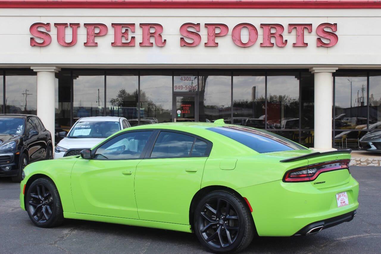 2023 Lime Green Dodge Charger SXT (2C3CDXBG6PH) with an 3.6L V6 DOHC 24V engine, 8A transmission, located at 4301 NW 39th , Oklahoma City, OK, 73112, (405) 949-5600, 35.512135, -97.598671 - NO DRIVERS LICENCE -NO FULL COVERAGE INSURANCE - NO CREDIT CHECK. COME ON OVER TO SUPERSPORTS, TAKE A LOOK AND TEST DRIVE. PLEASE GIVE US A CALL AT (405) 949-5600. NO LICENCIA DE CONDUCIR - NO SEGURO DE COBERTURA TOTAL - NO VERIFICACION DE CREDITO. VISITENOS EN SUPERSPORTS, MIRE NUESTRO - Photo#4