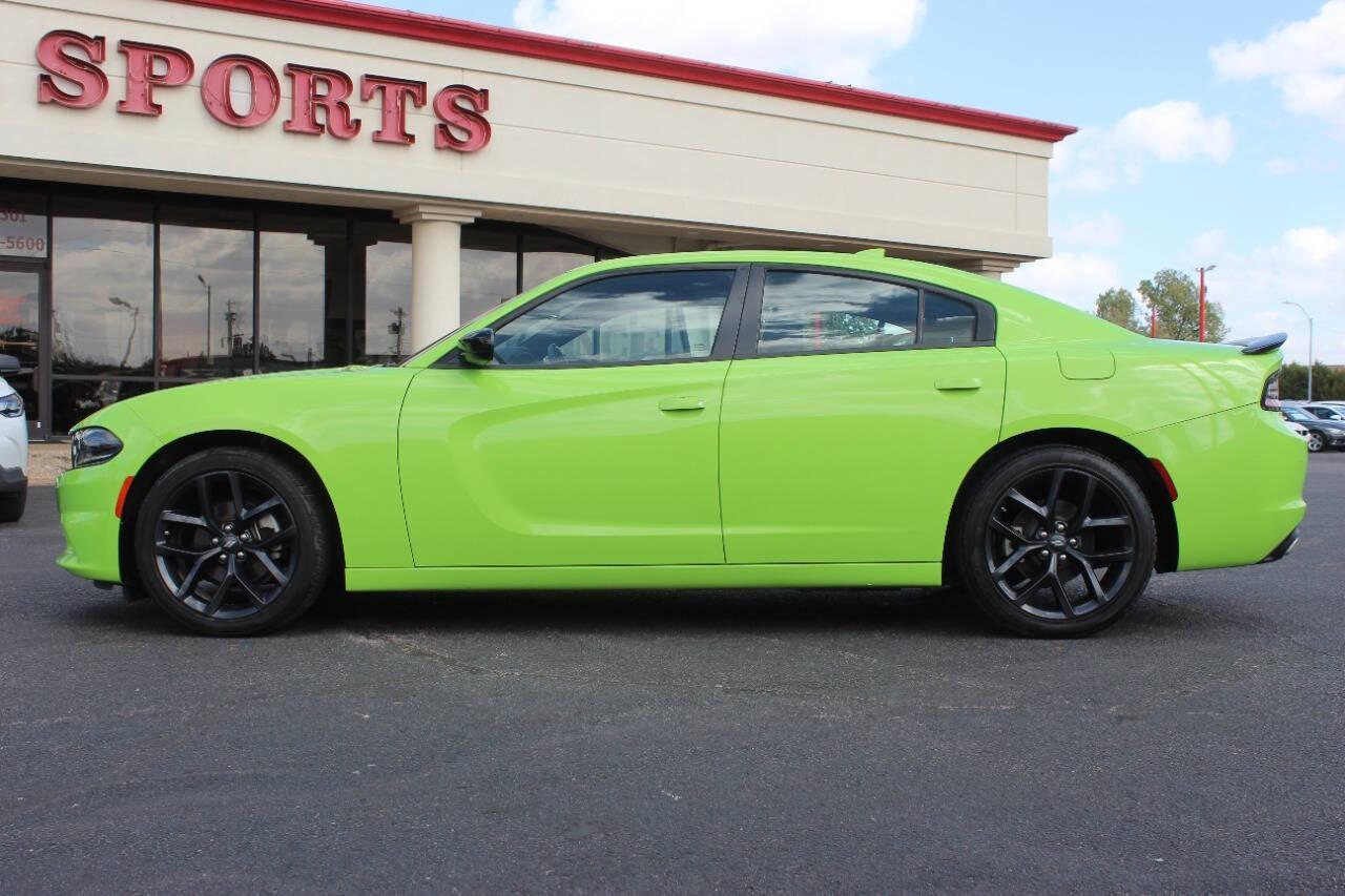 2023 Lime Green Dodge Charger SXT (2C3CDXBG6PH) with an 3.6L V6 DOHC 24V engine, 8A transmission, located at 4301 NW 39th , Oklahoma City, OK, 73112, (405) 949-5600, 35.512135, -97.598671 - NO DRIVERS LICENCE -NO FULL COVERAGE INSURANCE - NO CREDIT CHECK. COME ON OVER TO SUPERSPORTS, TAKE A LOOK AND TEST DRIVE. PLEASE GIVE US A CALL AT (405) 949-5600. NO LICENCIA DE CONDUCIR - NO SEGURO DE COBERTURA TOTAL - NO VERIFICACION DE CREDITO. VISITENOS EN SUPERSPORTS, MIRE NUESTRO - Photo#5
