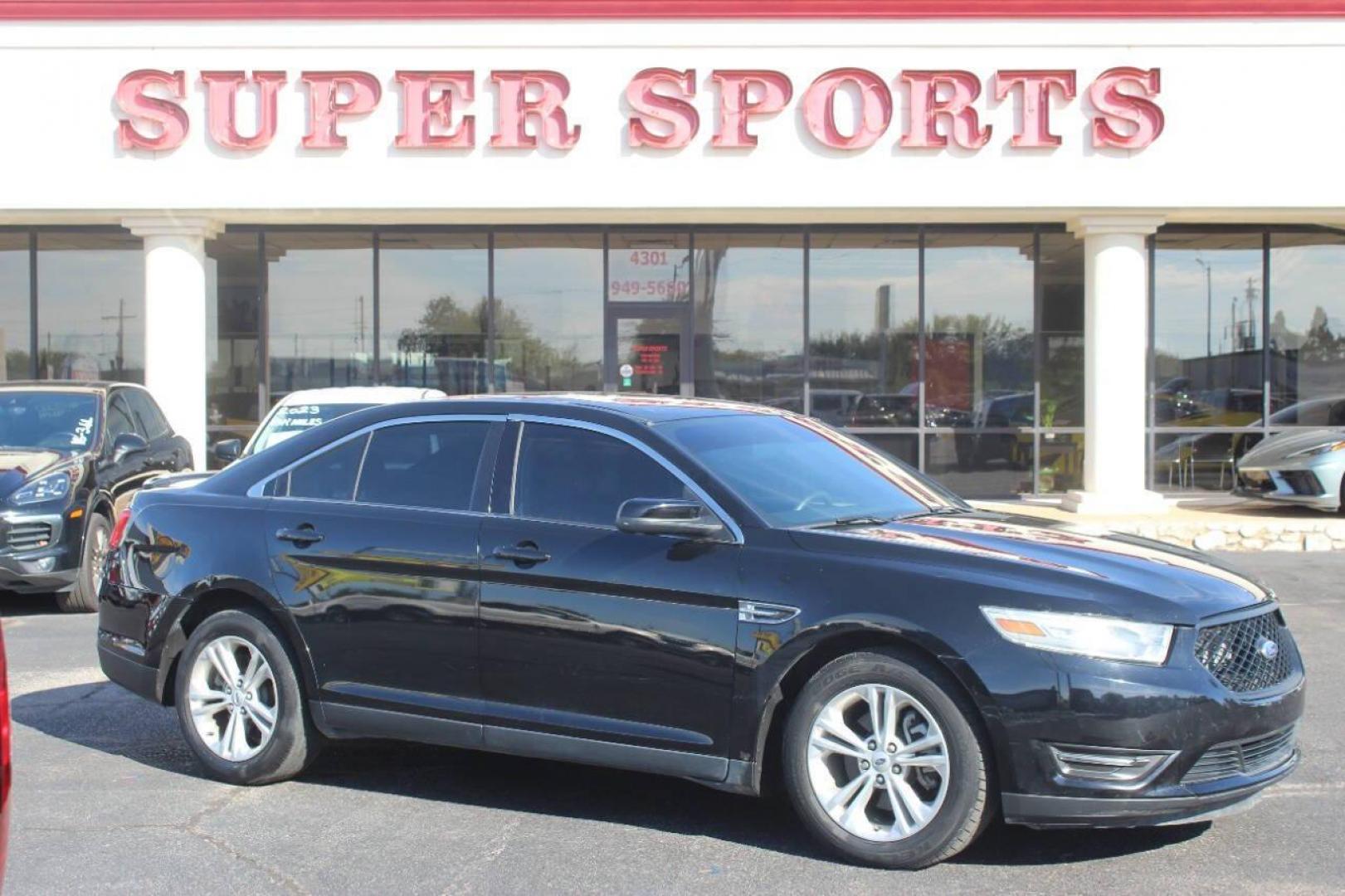 2017 Black Ford Taurus SEL FWD (1FAHP2E8XHG) with an 3.5L V6 DOHC 24V engine, 6A transmission, located at 4301 NW 39th , Oklahoma City, OK, 73112, (405) 949-5600, 35.512135, -97.598671 - NO DRIVERS LICENCE NO-FULL COVERAGE INSURANCE-NO CREDIT CHECK. COME ON OVER TO SUPERSPORTS AND TAKE A LOOK AND TEST DRIVE. PLEASE GIVE US A CALL AT (405) 949-5600. NO LICENSIA DE MANEJAR- NO SEGURO DE COBERTURA TOTAL- NO VERIFICACCION DE CREDITO. POR FAVOR VENGAN A SUPERSPORTS, ECHE UN - Photo#2
