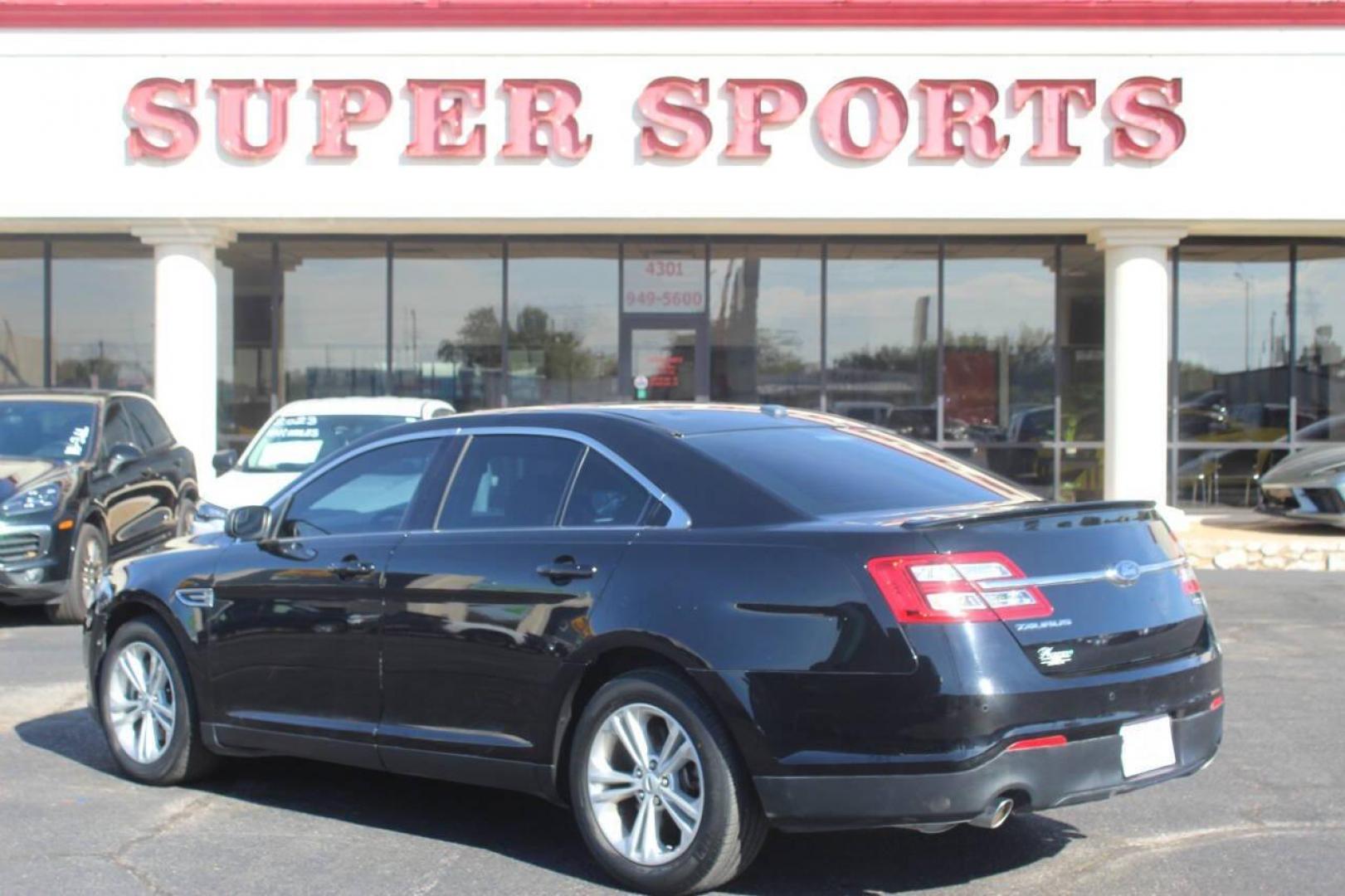 2017 Black Ford Taurus SEL FWD (1FAHP2E8XHG) with an 3.5L V6 DOHC 24V engine, 6A transmission, located at 4301 NW 39th , Oklahoma City, OK, 73112, (405) 949-5600, 35.512135, -97.598671 - NO DRIVERS LICENCE NO-FULL COVERAGE INSURANCE-NO CREDIT CHECK. COME ON OVER TO SUPERSPORTS AND TAKE A LOOK AND TEST DRIVE. PLEASE GIVE US A CALL AT (405) 949-5600. NO LICENSIA DE MANEJAR- NO SEGURO DE COBERTURA TOTAL- NO VERIFICACCION DE CREDITO. POR FAVOR VENGAN A SUPERSPORTS, ECHE UN - Photo#5