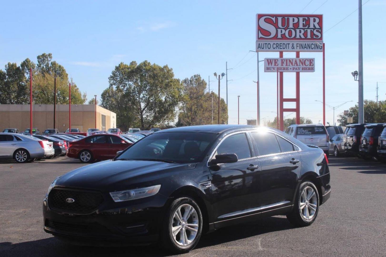 2017 Black Ford Taurus SEL FWD (1FAHP2E8XHG) with an 3.5L V6 DOHC 24V engine, 6A transmission, located at 4301 NW 39th , Oklahoma City, OK, 73112, (405) 949-5600, 35.512135, -97.598671 - NO DRIVERS LICENCE NO-FULL COVERAGE INSURANCE-NO CREDIT CHECK. COME ON OVER TO SUPERSPORTS AND TAKE A LOOK AND TEST DRIVE. PLEASE GIVE US A CALL AT (405) 949-5600. NO LICENSIA DE MANEJAR- NO SEGURO DE COBERTURA TOTAL- NO VERIFICACCION DE CREDITO. POR FAVOR VENGAN A SUPERSPORTS, ECHE UN - Photo#7