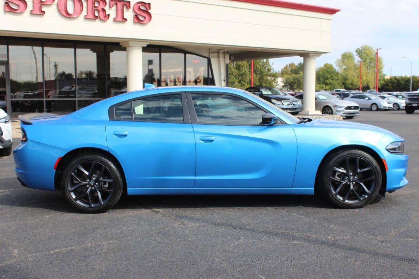 2023 Blue Dodge Charger SXT (2C3CDXBG6PH) with an 3.6L V6 DOHC 24V engine, 8A transmission, located at 4301 NW 39th , Oklahoma City, OK, 73112, (405) 949-5600, 35.512135, -97.598671 - NO DRIVERS LICENCE NO-FULL COVERAGE INSURANCE-NO CREDIT CHECK. COME ON OVER TO SUPERSPORTS AND TAKE A LOOK AND TEST DRIVE. PLEASE GIVE US A CALL AT (405) 949-5600. NO LICENSIA DE MANEJAR- NO SEGURO DE COBERTURA TOTAL- NO VERIFICACCION DE CREDITO. POR FAVOR VENGAN A SUPERSPORTS, ECHE UN - Photo#3