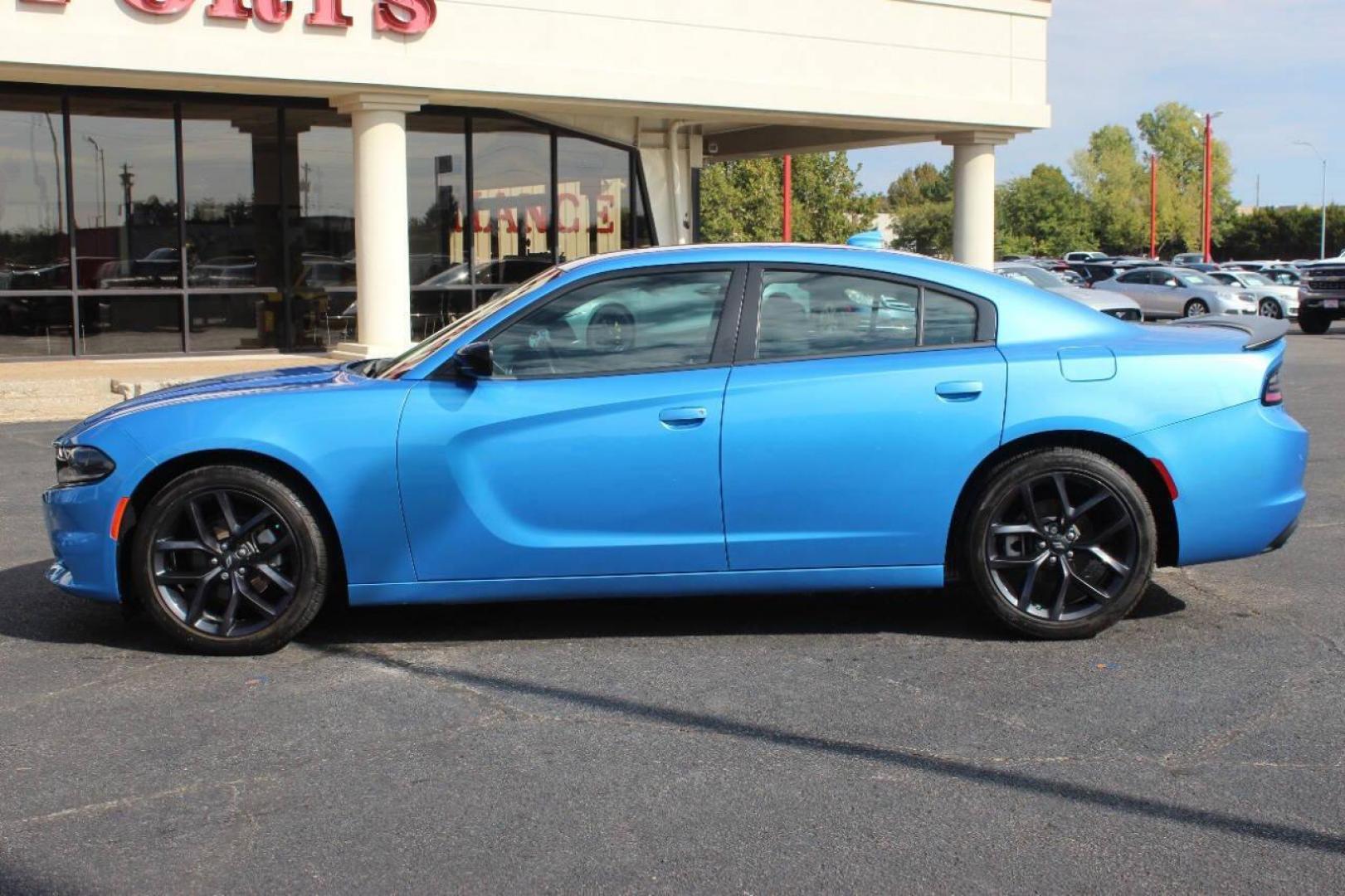 2023 Blue Dodge Charger SXT (2C3CDXBG6PH) with an 3.6L V6 DOHC 24V engine, 8A transmission, located at 4301 NW 39th , Oklahoma City, OK, 73112, (405) 949-5600, 35.512135, -97.598671 - Photo#6