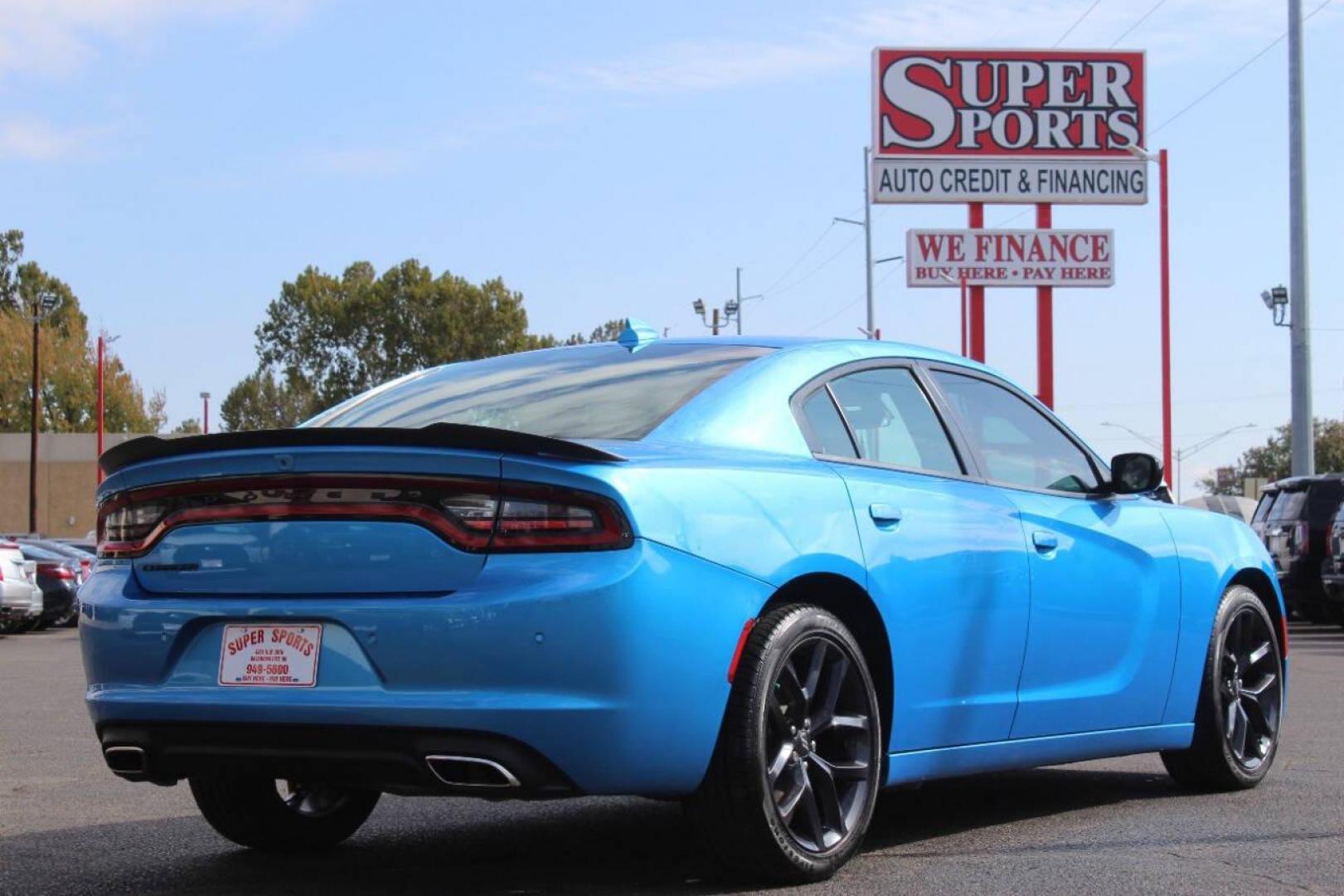 2023 Blue Dodge Charger SXT (2C3CDXBG6PH) with an 3.6L V6 DOHC 24V engine, 8A transmission, located at 4301 NW 39th , Oklahoma City, OK, 73112, (405) 949-5600, 35.512135, -97.598671 - NO DRIVERS LICENCE NO-FULL COVERAGE INSURANCE-NO CREDIT CHECK. COME ON OVER TO SUPERSPORTS AND TAKE A LOOK AND TEST DRIVE. PLEASE GIVE US A CALL AT (405) 949-5600. NO LICENSIA DE MANEJAR- NO SEGURO DE COBERTURA TOTAL- NO VERIFICACCION DE CREDITO. POR FAVOR VENGAN A SUPERSPORTS, ECHE UN - Photo#4