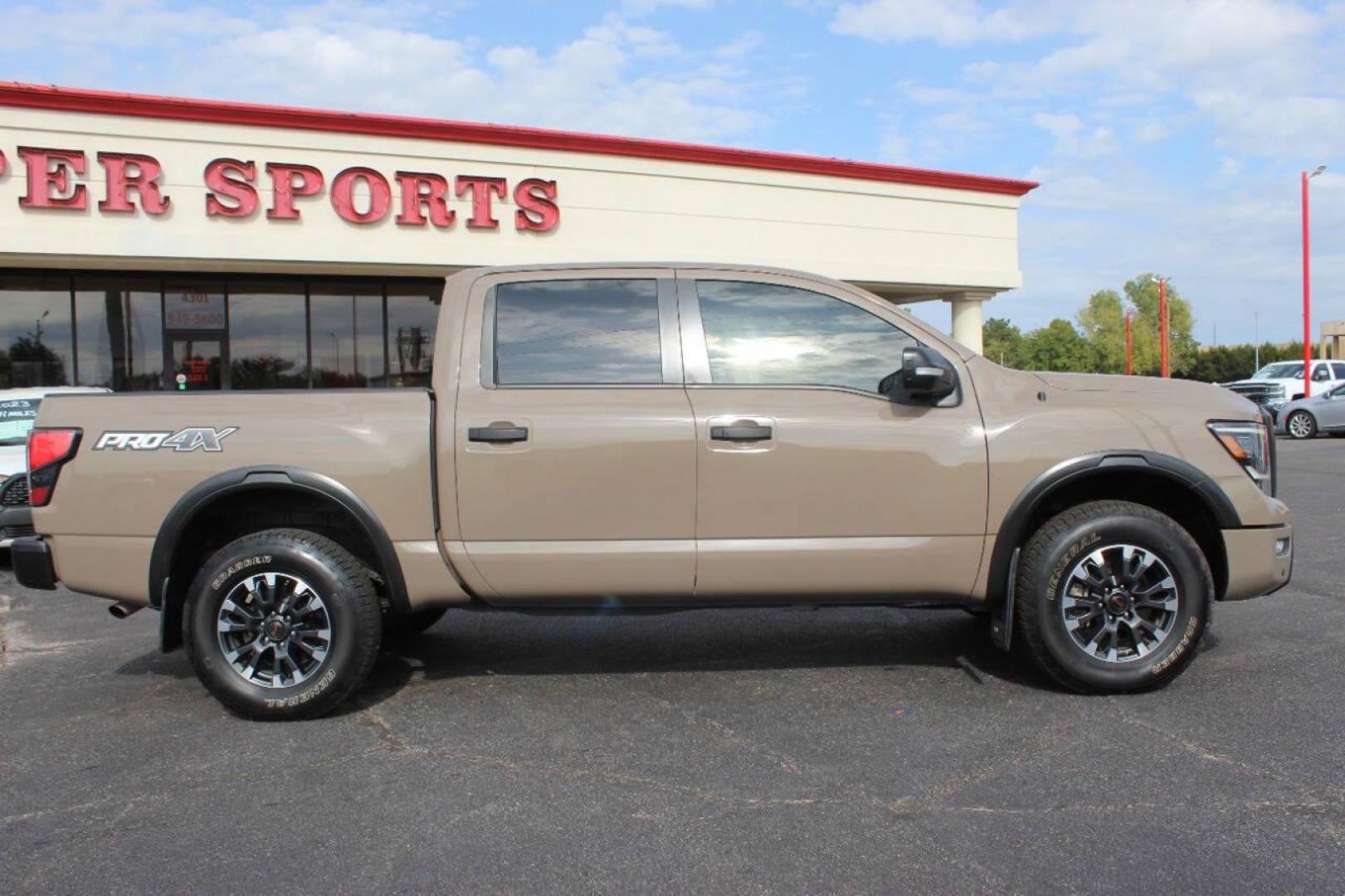 2020 Tan Nissan Titan Platinum Reserve Crew Cab 4WD (1N6AA1ED5LN) with an 5.6L V8 DOHC 32V engine, 6A transmission, located at 4301 NW 39th , Oklahoma City, OK, 73112, (405) 949-5600, 35.512135, -97.598671 - NO DRIVERS LICENCE NO-FULL COVERAGE INSURANCE-NO CREDIT CHECK. COME ON OVER TO SUPERSPORTS AND TAKE A LOOK AND TEST DRIVE. PLEASE GIVE US A CALL AT (405) 949-5600. NO LICENSIA DE MANEJAR- NO SEGURO DE COBERTURA TOTAL- NO VERIFICACCION DE CREDITO. POR FAVOR VENGAN A SUPERSPORTS, ECHE UN - Photo#2