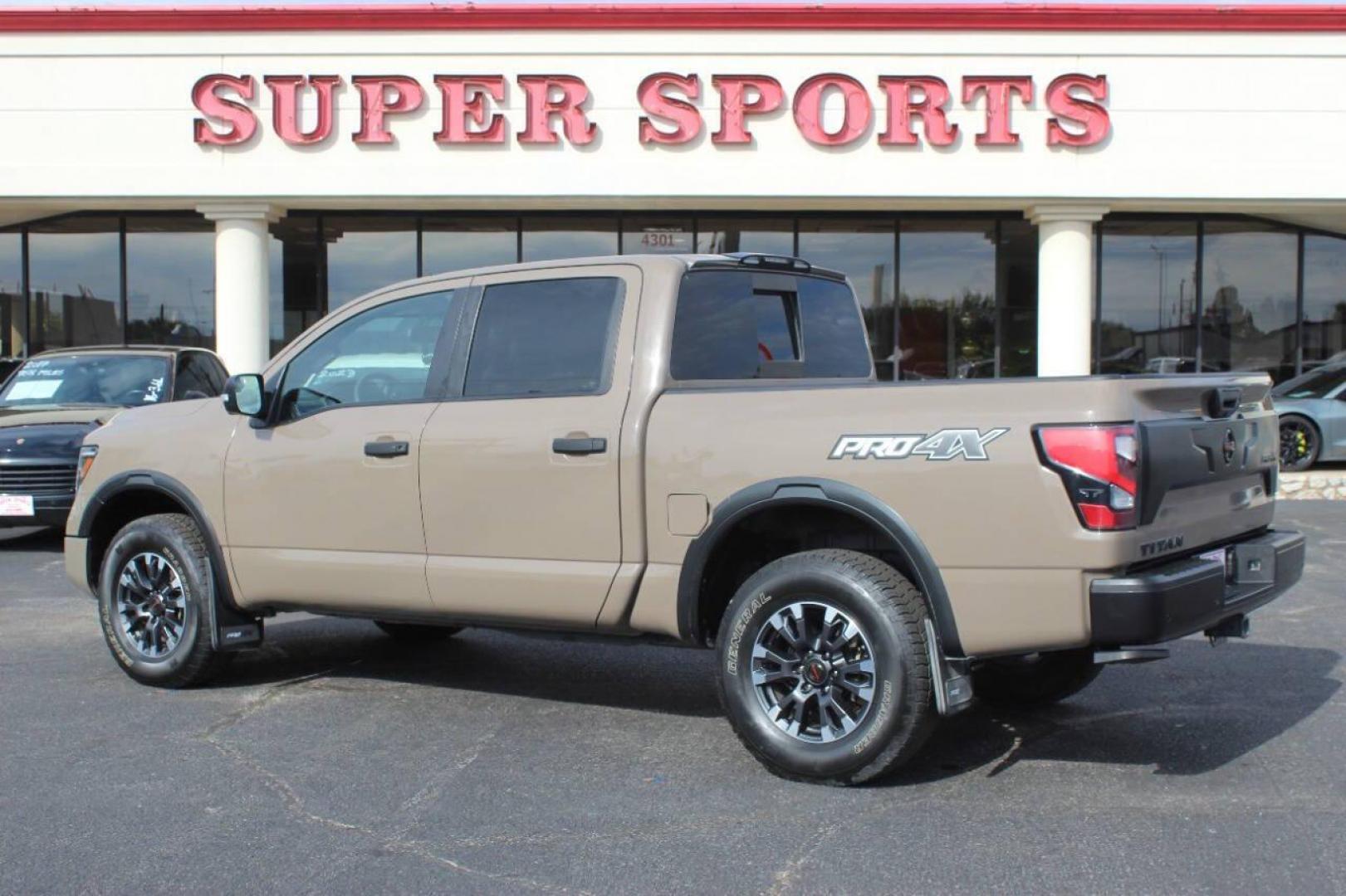 2020 Tan Nissan Titan Platinum Reserve Crew Cab 4WD (1N6AA1ED5LN) with an 5.6L V8 DOHC 32V engine, 6A transmission, located at 4301 NW 39th , Oklahoma City, OK, 73112, (405) 949-5600, 35.512135, -97.598671 - NO DRIVERS LICENCE NO-FULL COVERAGE INSURANCE-NO CREDIT CHECK. COME ON OVER TO SUPERSPORTS AND TAKE A LOOK AND TEST DRIVE. PLEASE GIVE US A CALL AT (405) 949-5600. NO LICENSIA DE MANEJAR- NO SEGURO DE COBERTURA TOTAL- NO VERIFICACCION DE CREDITO. POR FAVOR VENGAN A SUPERSPORTS, ECHE UN - Photo#4