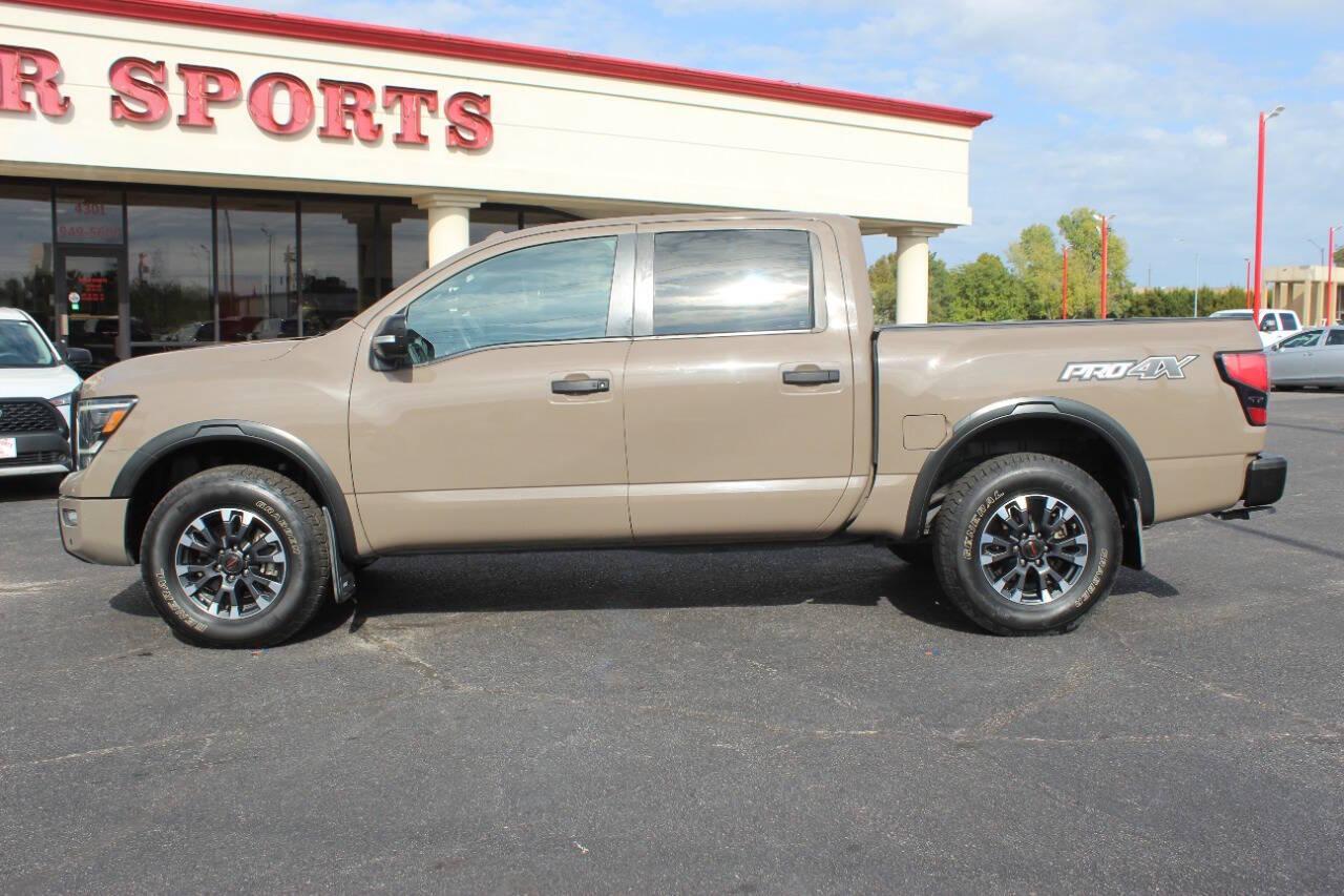 2020 Tan Nissan Titan Platinum Reserve Crew Cab 4WD (1N6AA1ED5LN) with an 5.6L V8 5.6L V8 engine, Automatic 9-Speed transmission, located at 4301 NW 39th , Oklahoma City, OK, 73112, (405) 949-5600, 35.512135, -97.598671 - NO DRIVERS LICENCE NO-FULL COVERAGE INSURANCE-NO CREDIT CHECK. COME ON OVER TO SUPERSPORTS AND TAKE A LOOK AND TEST DRIVE. PLEASE GIVE US A CALL AT (405) 949-5600. NO LICENSIA DE MANEJAR- NO SEGURO DE COBERTURA TOTAL- NO VERIFICACCION DE CREDITO. POR FAVOR VENGAN A SUPERSPORTS, ECHE UN - Photo#5