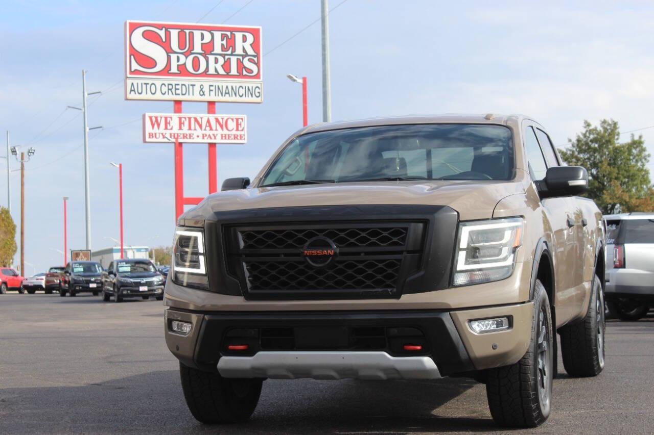 2020 Tan Nissan Titan Platinum Reserve Crew Cab 4WD (1N6AA1ED5LN) with an 5.6L V8 5.6L V8 engine, Automatic 9-Speed transmission, located at 4301 NW 39th , Oklahoma City, OK, 73112, (405) 949-5600, 35.512135, -97.598671 - NO DRIVERS LICENCE NO-FULL COVERAGE INSURANCE-NO CREDIT CHECK. COME ON OVER TO SUPERSPORTS AND TAKE A LOOK AND TEST DRIVE. PLEASE GIVE US A CALL AT (405) 949-5600. NO LICENSIA DE MANEJAR- NO SEGURO DE COBERTURA TOTAL- NO VERIFICACCION DE CREDITO. POR FAVOR VENGAN A SUPERSPORTS, ECHE UN - Photo#7