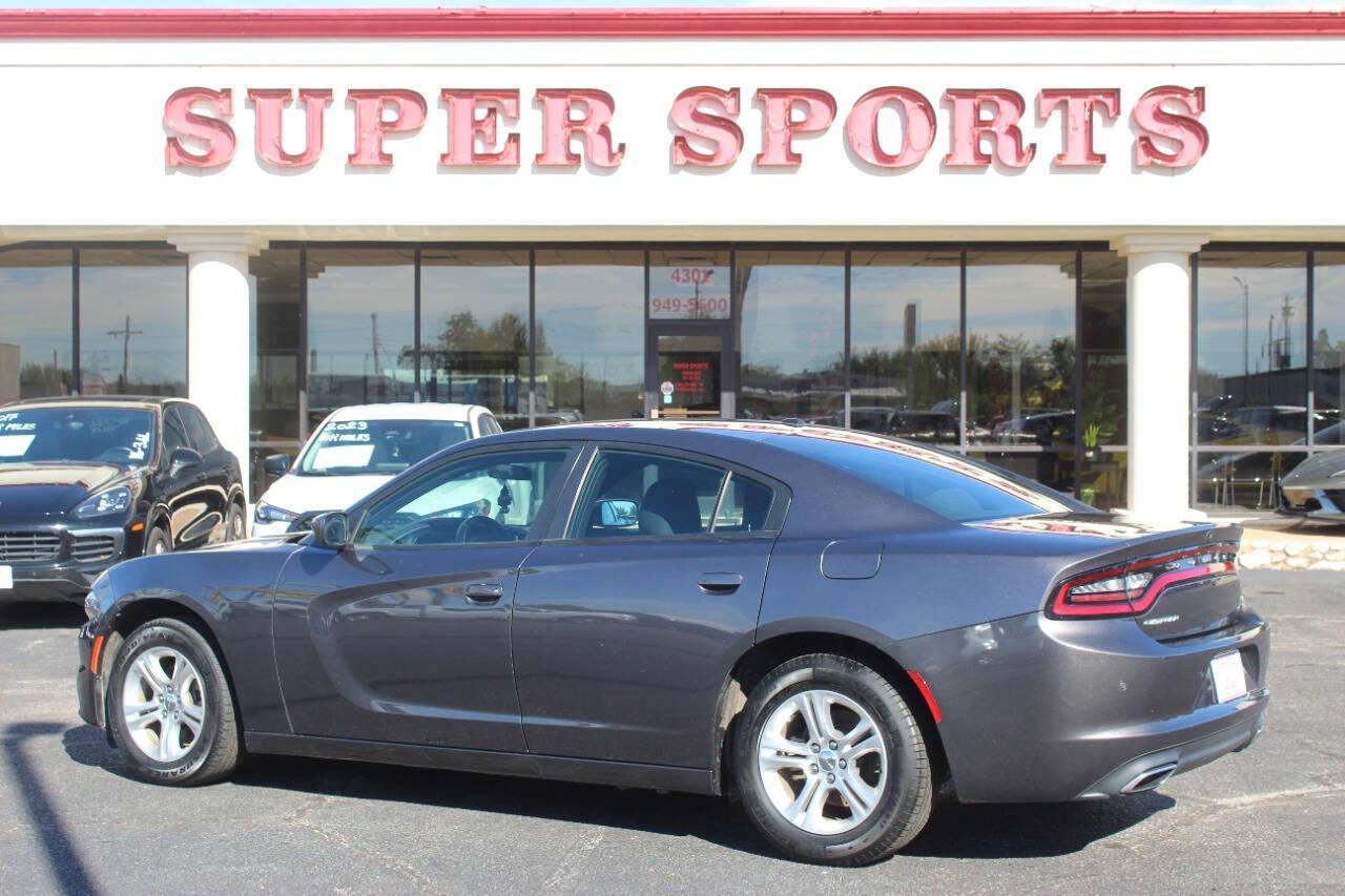 2021 Gray Dodge Charger SXT (2C3CDXBG0MH) with an 3.6L V6 DOHC 24V engine, 8A transmission, located at 4301 NW 39th , Oklahoma City, OK, 73112, (405) 949-5600, 35.512135, -97.598671 - NO DRIVERS LICENCE -NO FULL COVERAGE INSURANCE - NO CREDIT CHECK. COME ON OVER TO SUPERSPORTS, TAKE A LOOK AND TEST DRIVE. PLEASE GIVE US A CALL AT (405) 949-5600. NO LICENCIA DE CONDUCIR - NO SEGURO DE COBERTURA TOTAL - NO VERIFICACION DE CREDITO. VISITENOS EN SUPERSPORTS, MIRE NUESTRO - Photo#4