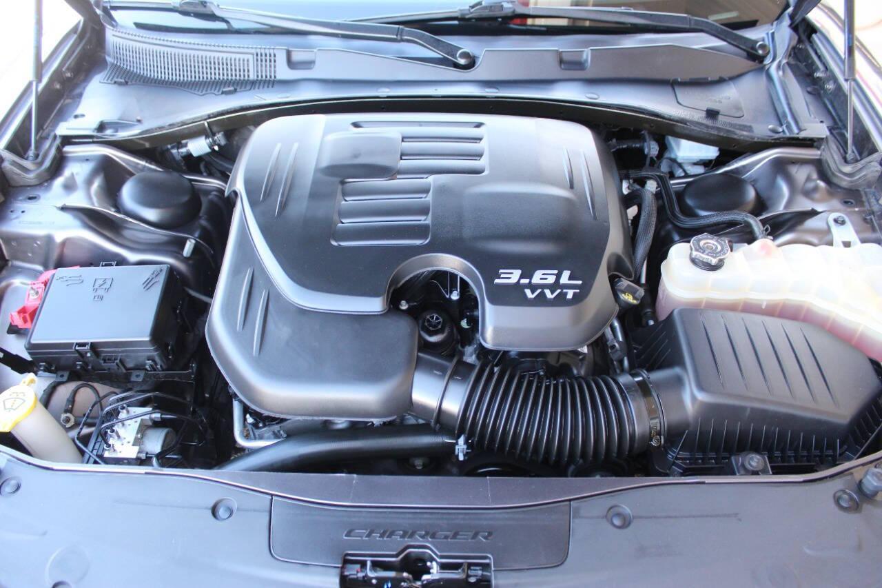 2021 Gray Dodge Charger SXT (2C3CDXBG0MH) with an 3.6L V6 DOHC 24V engine, 8A transmission, located at 4301 NW 39th , Oklahoma City, OK, 73112, (405) 949-5600, 35.512135, -97.598671 - NO DRIVERS LICENCE -NO FULL COVERAGE INSURANCE - NO CREDIT CHECK. COME ON OVER TO SUPERSPORTS, TAKE A LOOK AND TEST DRIVE. PLEASE GIVE US A CALL AT (405) 949-5600. NO LICENCIA DE CONDUCIR - NO SEGURO DE COBERTURA TOTAL - NO VERIFICACION DE CREDITO. VISITENOS EN SUPERSPORTS, MIRE NUESTRO - Photo#7