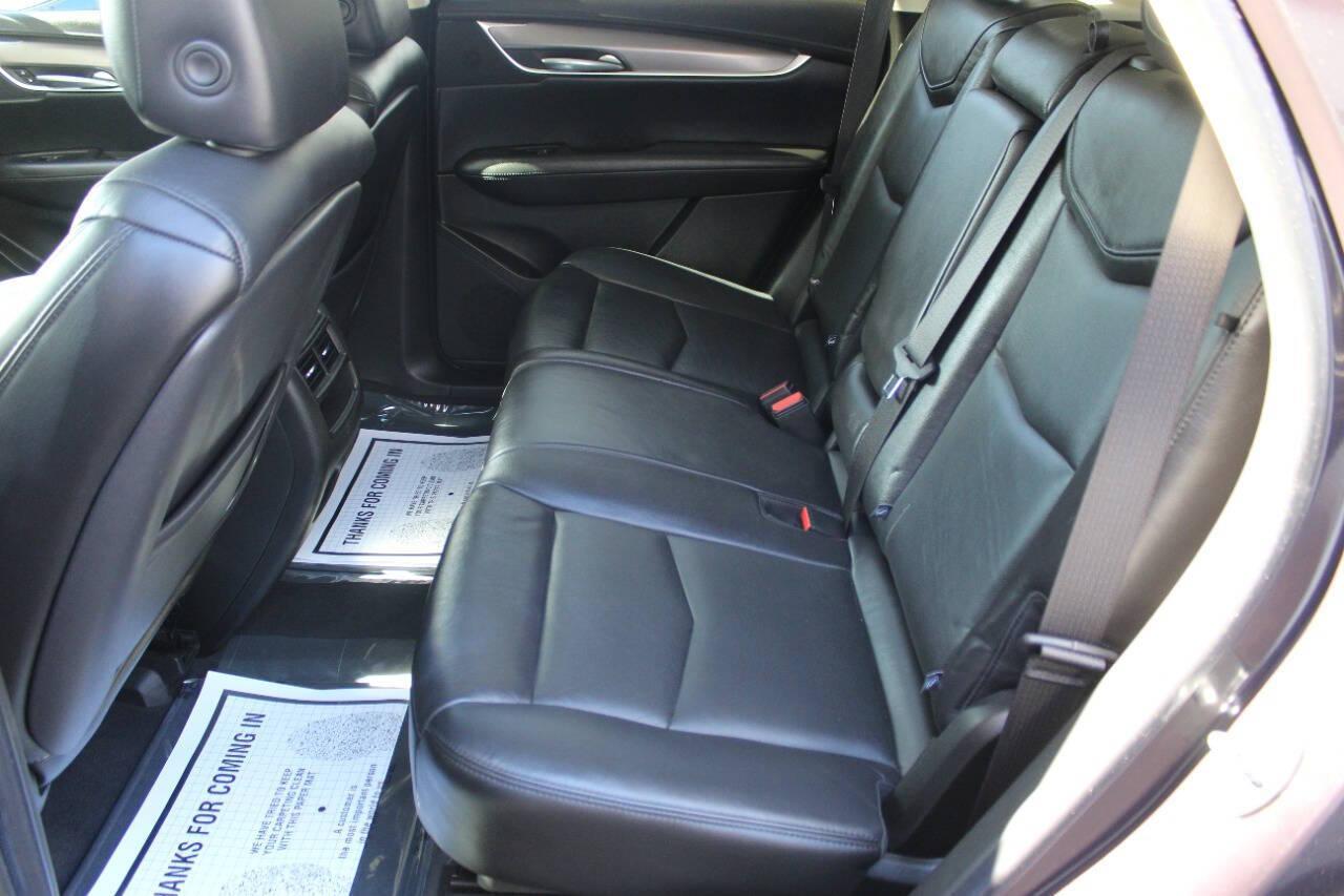 2018 Purple Cadillac XT5 Luxury (1GYKNCRS5JZ) with an 3.6L V6 3.6L V6 engine, Automatic 8-Speed transmission, located at 4301 NW 39th , Oklahoma City, OK, 73112, (405) 949-5600, 35.512135, -97.598671 - NO DRIVERS LICENCE NO-FULL COVERAGE INSURANCE-NO CREDIT CHECK. COME ON OVER TO SUPERSPORTS AND TAKE A LOOK AND TEST DRIVE. PLEASE GIVE US A CALL AT (405) 949-5600. NO LICENSIA DE MANEJAR- NO SEGURO DE COBERTURA TOTAL- NO VERIFICACCION DE CREDITO. POR FAVOR VENGAN A SUPERSPORTS, ECHE UN - Photo#14