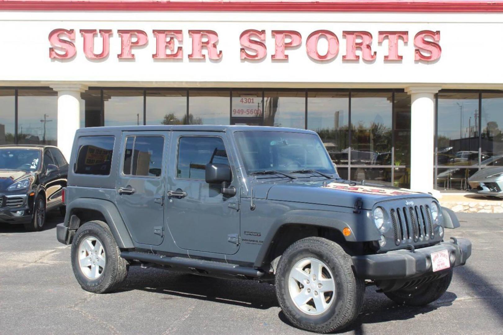 2016 Gray Jeep Wrangler Unlimited Sport 4WD (1C4BJWDG0GL) with an 3.6L V6 DOHC 24V FFV engine, Automatic 5-Speed transmission, located at 4301 NW 39th , Oklahoma City, OK, 73112, (405) 949-5600, 35.512135, -97.598671 - NO DRIVERS LICENCE NO-FULL COVERAGE INSURANCE-NO CREDIT CHECK. COME ON OVER TO SUPERSPORTS AND TAKE A LOOK AND TEST DRIVE. PLEASE GIVE US A CALL AT (405) 949-5600. NO LICENSIA DE MANEJAR- NO SEGURO DE COBERTURA TOTAL- NO VERIFICACCION DE CREDITO. POR FAVOR VENGAN A SUPERSPORTS, ECHE UN - Photo#2