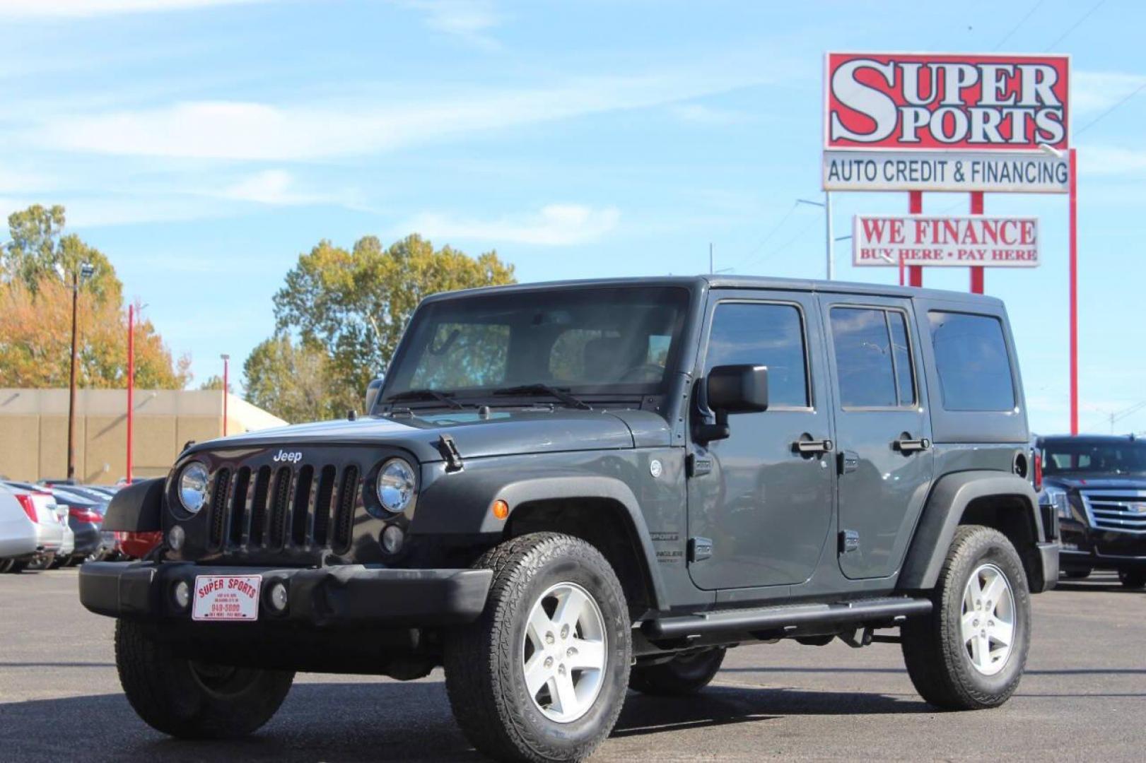 2016 Gray Jeep Wrangler Unlimited Sport 4WD (1C4BJWDG0GL) with an 3.6L V6 DOHC 24V FFV engine, Automatic 5-Speed transmission, located at 4301 NW 39th , Oklahoma City, OK, 73112, (405) 949-5600, 35.512135, -97.598671 - NO DRIVERS LICENCE NO-FULL COVERAGE INSURANCE-NO CREDIT CHECK. COME ON OVER TO SUPERSPORTS AND TAKE A LOOK AND TEST DRIVE. PLEASE GIVE US A CALL AT (405) 949-5600. NO LICENSIA DE MANEJAR- NO SEGURO DE COBERTURA TOTAL- NO VERIFICACCION DE CREDITO. POR FAVOR VENGAN A SUPERSPORTS, ECHE UN - Photo#7