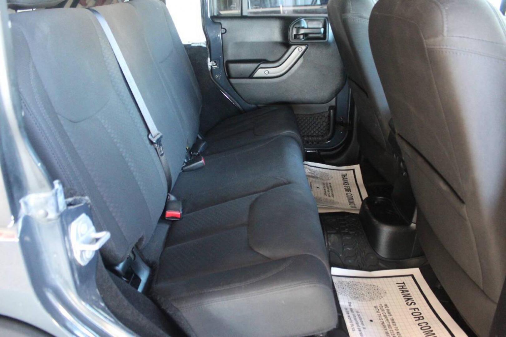 2016 Gray Jeep Wrangler Unlimited Sport 4WD (1C4BJWDG0GL) with an 3.6L V6 DOHC 24V FFV engine, Automatic 5-Speed transmission, located at 4301 NW 39th , Oklahoma City, OK, 73112, (405) 949-5600, 35.512135, -97.598671 - NO DRIVERS LICENCE NO-FULL COVERAGE INSURANCE-NO CREDIT CHECK. COME ON OVER TO SUPERSPORTS AND TAKE A LOOK AND TEST DRIVE. PLEASE GIVE US A CALL AT (405) 949-5600. NO LICENSIA DE MANEJAR- NO SEGURO DE COBERTURA TOTAL- NO VERIFICACCION DE CREDITO. POR FAVOR VENGAN A SUPERSPORTS, ECHE UN - Photo#10