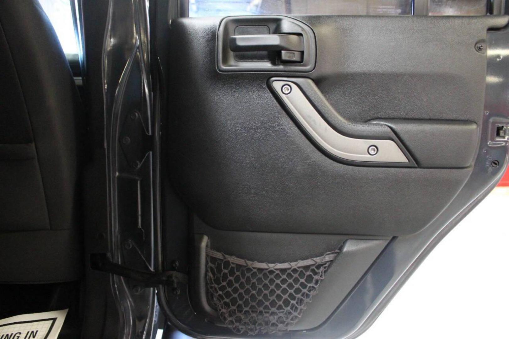 2016 Gray Jeep Wrangler Unlimited Sport 4WD (1C4BJWDG0GL) with an 3.6L V6 DOHC 24V FFV engine, Automatic 5-Speed transmission, located at 4301 NW 39th , Oklahoma City, OK, 73112, (405) 949-5600, 35.512135, -97.598671 - NO DRIVERS LICENCE NO-FULL COVERAGE INSURANCE-NO CREDIT CHECK. COME ON OVER TO SUPERSPORTS AND TAKE A LOOK AND TEST DRIVE. PLEASE GIVE US A CALL AT (405) 949-5600. NO LICENSIA DE MANEJAR- NO SEGURO DE COBERTURA TOTAL- NO VERIFICACCION DE CREDITO. POR FAVOR VENGAN A SUPERSPORTS, ECHE UN - Photo#11
