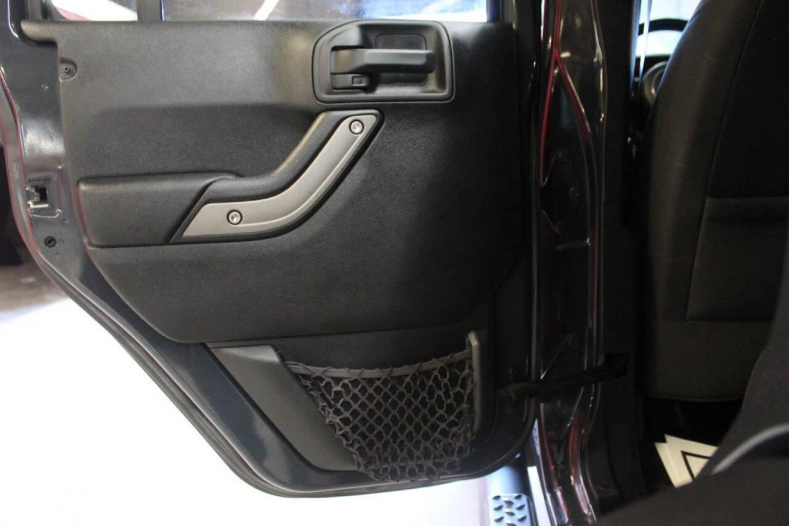 2016 Gray Jeep Wrangler Unlimited Sport 4WD (1C4BJWDG0GL) with an 3.6L V6 DOHC 24V FFV engine, Automatic 5-Speed transmission, located at 4301 NW 39th , Oklahoma City, OK, 73112, (405) 949-5600, 35.512135, -97.598671 - NO DRIVERS LICENCE NO-FULL COVERAGE INSURANCE-NO CREDIT CHECK. COME ON OVER TO SUPERSPORTS AND TAKE A LOOK AND TEST DRIVE. PLEASE GIVE US A CALL AT (405) 949-5600. NO LICENSIA DE MANEJAR- NO SEGURO DE COBERTURA TOTAL- NO VERIFICACCION DE CREDITO. POR FAVOR VENGAN A SUPERSPORTS, ECHE UN - Photo#14
