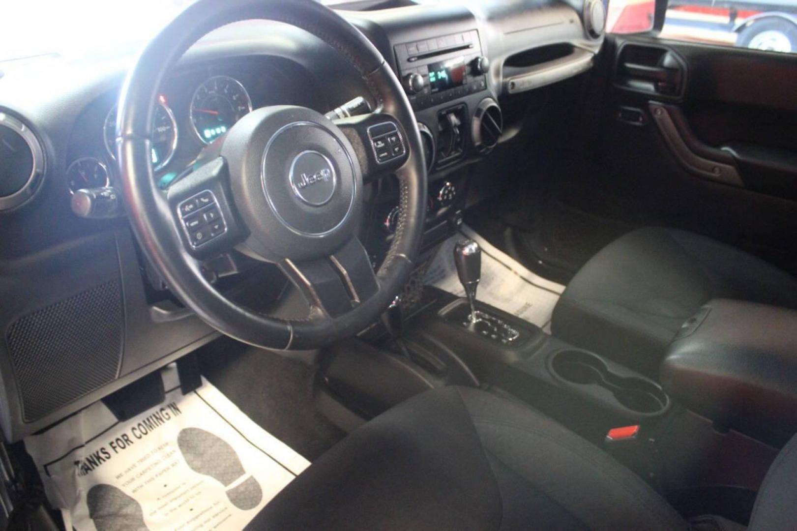 2016 Gray Jeep Wrangler Unlimited Sport 4WD (1C4BJWDG0GL) with an 3.6L V6 DOHC 24V FFV engine, Automatic 5-Speed transmission, located at 4301 NW 39th , Oklahoma City, OK, 73112, (405) 949-5600, 35.512135, -97.598671 - NO DRIVERS LICENCE NO-FULL COVERAGE INSURANCE-NO CREDIT CHECK. COME ON OVER TO SUPERSPORTS AND TAKE A LOOK AND TEST DRIVE. PLEASE GIVE US A CALL AT (405) 949-5600. NO LICENSIA DE MANEJAR- NO SEGURO DE COBERTURA TOTAL- NO VERIFICACCION DE CREDITO. POR FAVOR VENGAN A SUPERSPORTS, ECHE UN - Photo#15