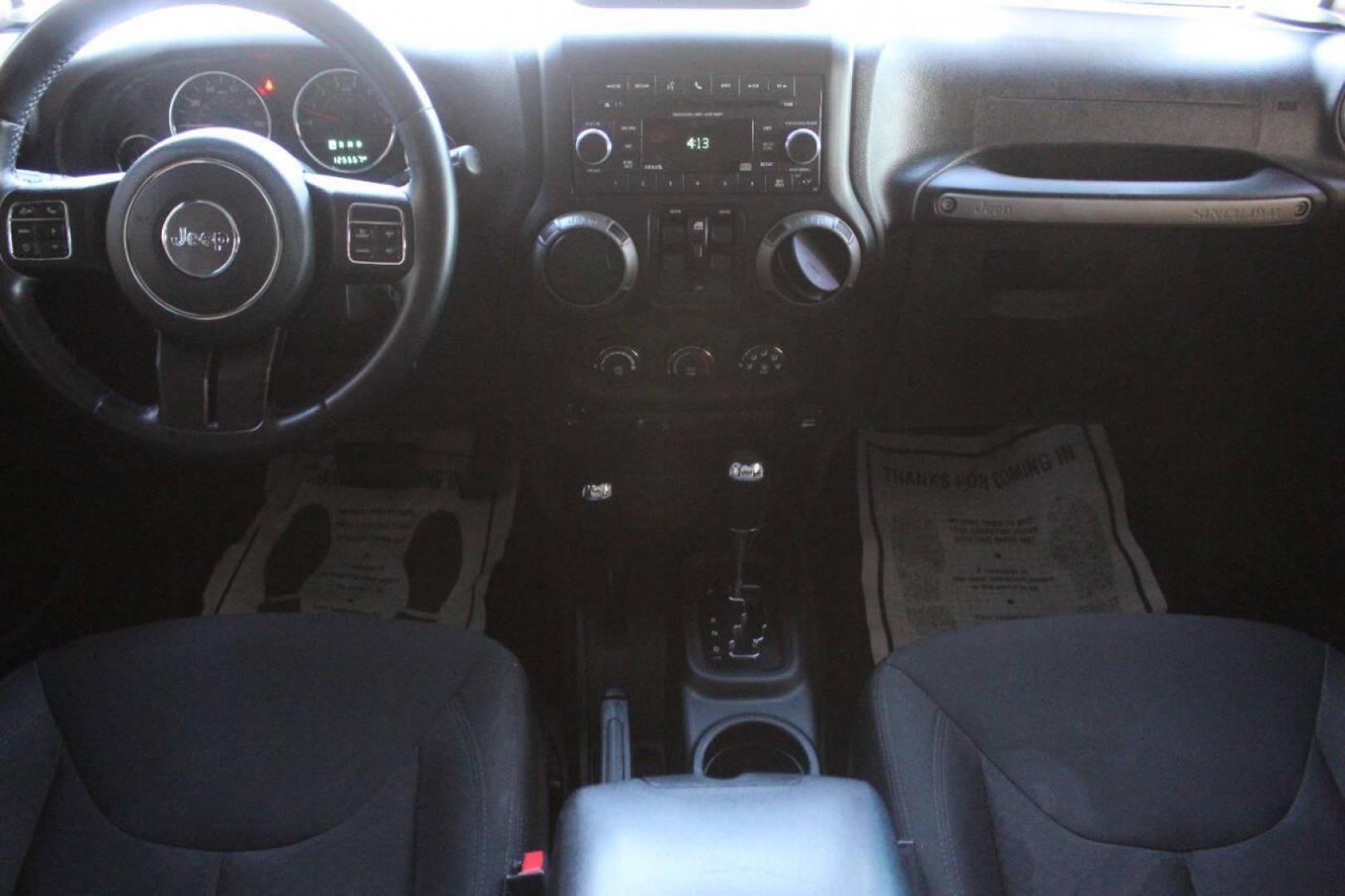 2016 Gray Jeep Wrangler Unlimited Sport 4WD (1C4BJWDG0GL) with an 3.6L V6 DOHC 24V FFV engine, Automatic 5-Speed transmission, located at 4301 NW 39th , Oklahoma City, OK, 73112, (405) 949-5600, 35.512135, -97.598671 - NO DRIVERS LICENCE NO-FULL COVERAGE INSURANCE-NO CREDIT CHECK. COME ON OVER TO SUPERSPORTS AND TAKE A LOOK AND TEST DRIVE. PLEASE GIVE US A CALL AT (405) 949-5600. NO LICENSIA DE MANEJAR- NO SEGURO DE COBERTURA TOTAL- NO VERIFICACCION DE CREDITO. POR FAVOR VENGAN A SUPERSPORTS, ECHE UN - Photo#17