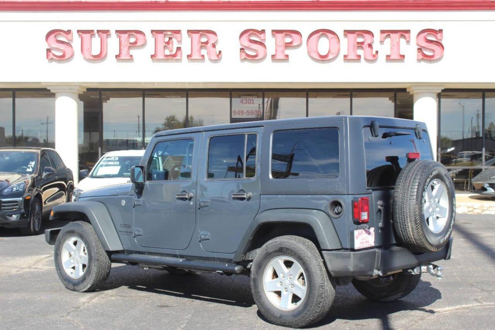 2016 Gray Jeep Wrangler Unlimited Sport 4WD (1C4BJWDG0GL) with an 3.6L V6 DOHC 24V FFV engine, Automatic 5-Speed transmission, located at 4301 NW 39th , Oklahoma City, OK, 73112, (405) 949-5600, 35.512135, -97.598671 - NO DRIVERS LICENCE NO-FULL COVERAGE INSURANCE-NO CREDIT CHECK. COME ON OVER TO SUPERSPORTS AND TAKE A LOOK AND TEST DRIVE. PLEASE GIVE US A CALL AT (405) 949-5600. NO LICENSIA DE MANEJAR- NO SEGURO DE COBERTURA TOTAL- NO VERIFICACCION DE CREDITO. POR FAVOR VENGAN A SUPERSPORTS, ECHE UN - Photo#5