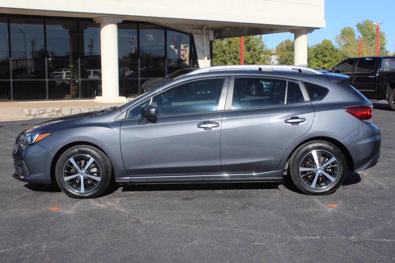 2023 Gray Subaru Impreza 2.0i Premium CVT 5-Door (4S3GTAV65P3) with an 2.0L H4 DOHC 16V engine, CVT transmission, located at 4301 NW 39th , Oklahoma City, OK, 73112, (405) 949-5600, 35.512135, -97.598671 - NO DRIVERS LICENCE -NO FULL COVERAGE INSURANCE - NO CREDIT CHECK. COME ON OVER TO SUPERSPORTS, TAKE A LOOK AND TEST DRIVE. PLEASE GIVE US A CALL AT (405) 949-5600. NO LICENCIA DE CONDUCIR - NO SEGURO DE COBERTURA TOTAL - NO VERIFICACION DE CREDITO. VISITENOS EN SUPERSPORTS, MIRE NUESTRO - Photo#5