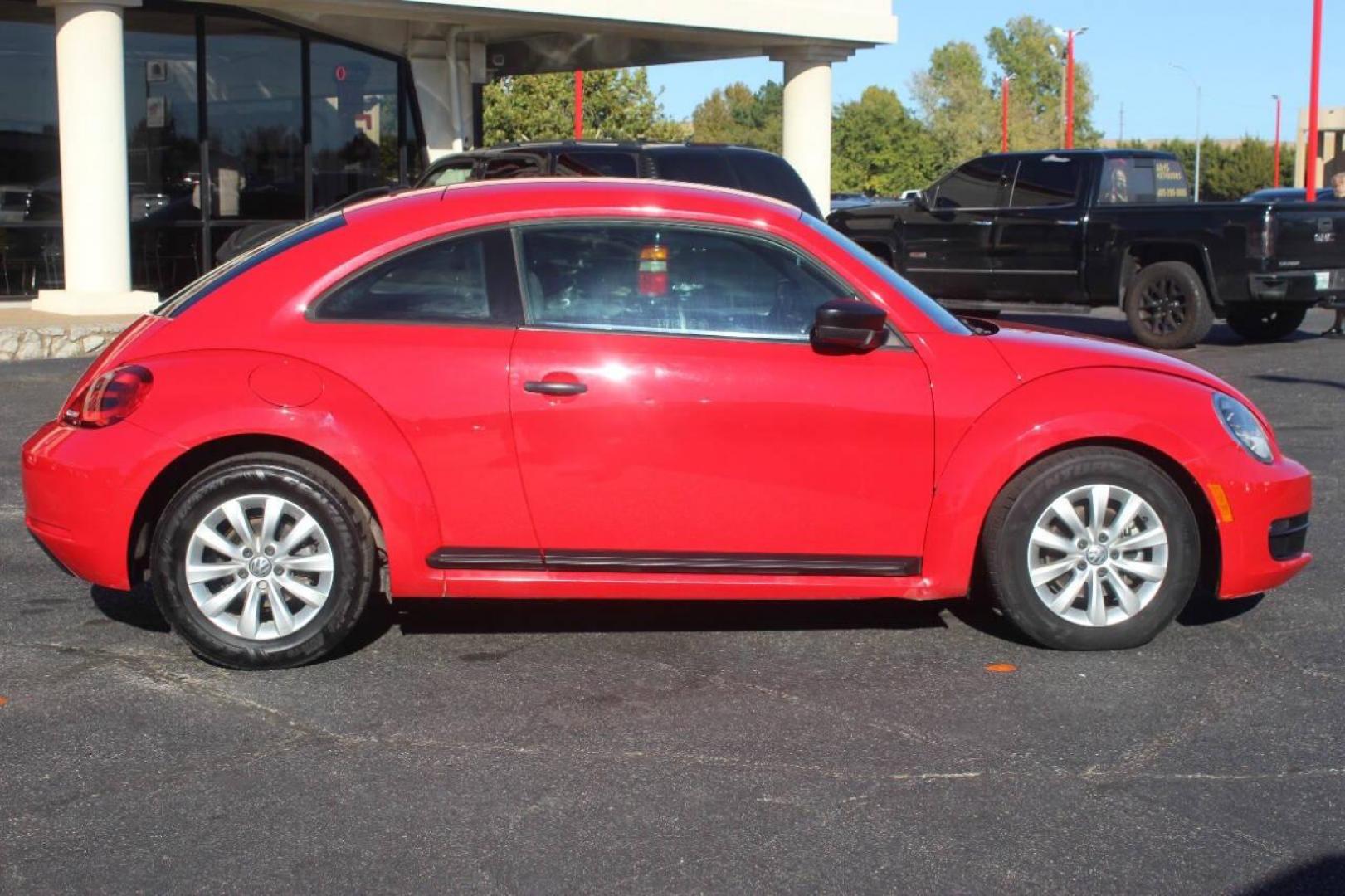 2013 Red Volkswagen Beetle 2.5L w/Sunroof Sound and Nav (3VWFP7AT7DM) with an 2.5L L5 DOHC 20V engine, 5-Speed Manual transmission, located at 4301 NW 39th , Oklahoma City, OK, 73112, (405) 949-5600, 35.512135, -97.598671 - NO DRIVERS LICENCE NO-FULL COVERAGE INSURANCE-NO CREDIT CHECK. COME ON OVER TO SUPERSPORTS AND TAKE A LOOK AND TEST DRIVE. PLEASE GIVE US A CALL AT (405) 949-5600. NO LICENSIA DE MANEJAR- NO SEGURO DE COBERTURA TOTAL- NO VERIFICACCION DE CREDITO. POR FAVOR VENGAN A SUPERSPORTS, ECHE UN - Photo#2