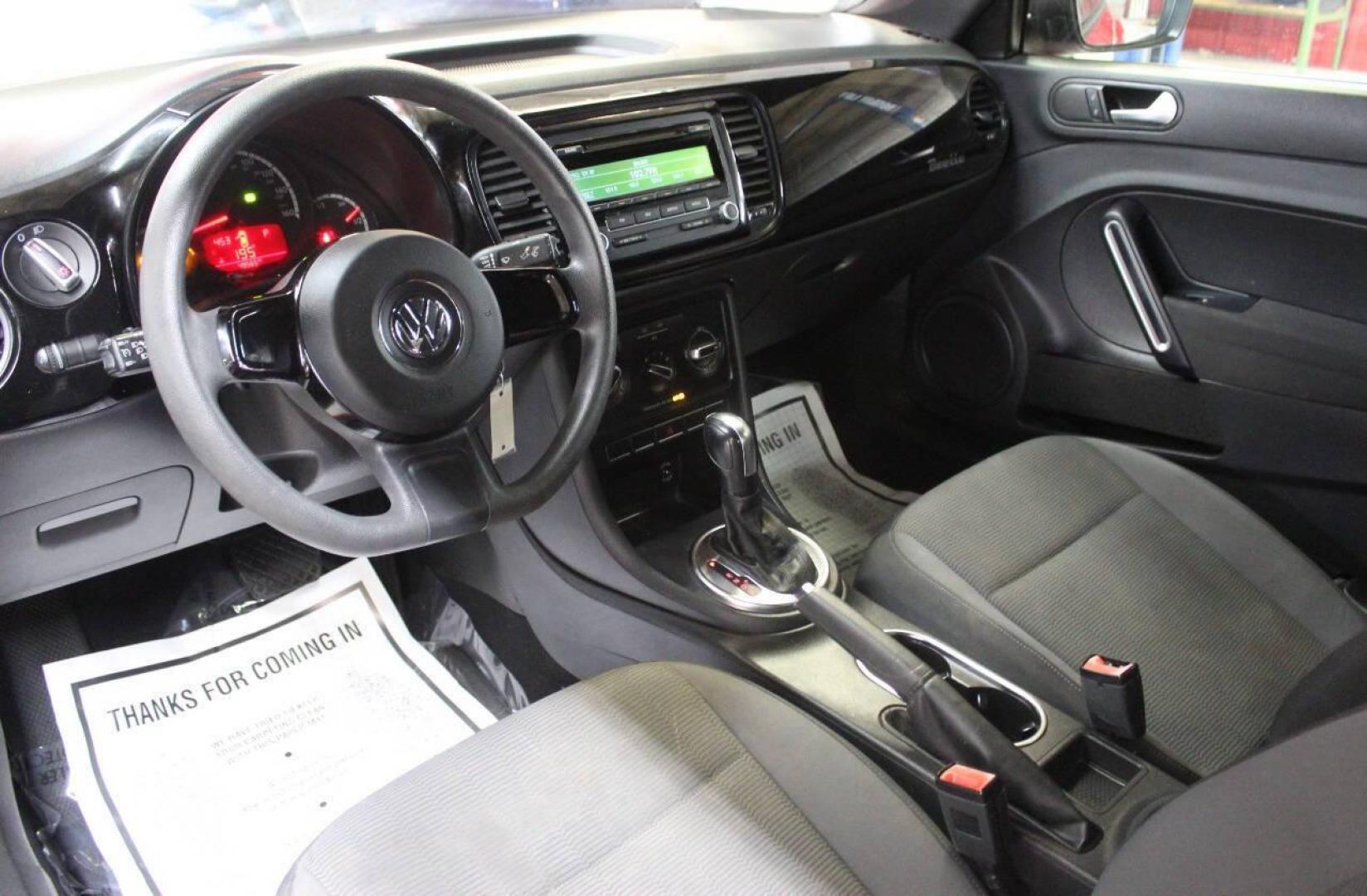 2013 Red Volkswagen Beetle 2.5L w/Sunroof Sound and Nav (3VWFP7AT7DM) with an 2.5L L5 DOHC 20V engine, 5-Speed Manual transmission, located at 4301 NW 39th , Oklahoma City, OK, 73112, (405) 949-5600, 35.512135, -97.598671 - Photo#12