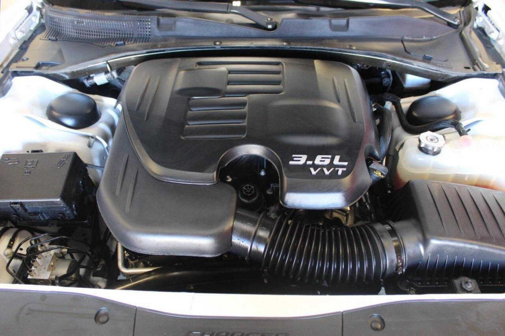 2022 White Dodge Charger SXT (2C3CDXBG6NH) with an 3.6L V6 DOHC 24V engine, 8A transmission, located at 4301 NW 39th , Oklahoma City, OK, 73112, (405) 949-5600, 35.512135, -97.598671 - NO DRIVERS LICENCE NO-FULL COVERAGE INSURANCE-NO CREDIT CHECK. COME ON OVER TO SUPERSPORTS AND TAKE A LOOK AND TEST DRIVE. PLEASE GIVE US A CALL AT (405) 949-5600. NO LICENSIA DE MANEJAR- NO SEGURO DE COBERTURA TOTAL- NO VERIFICACCION DE CREDITO. POR FAVOR VENGAN A SUPERSPORTS, ECHE UN - Photo#8