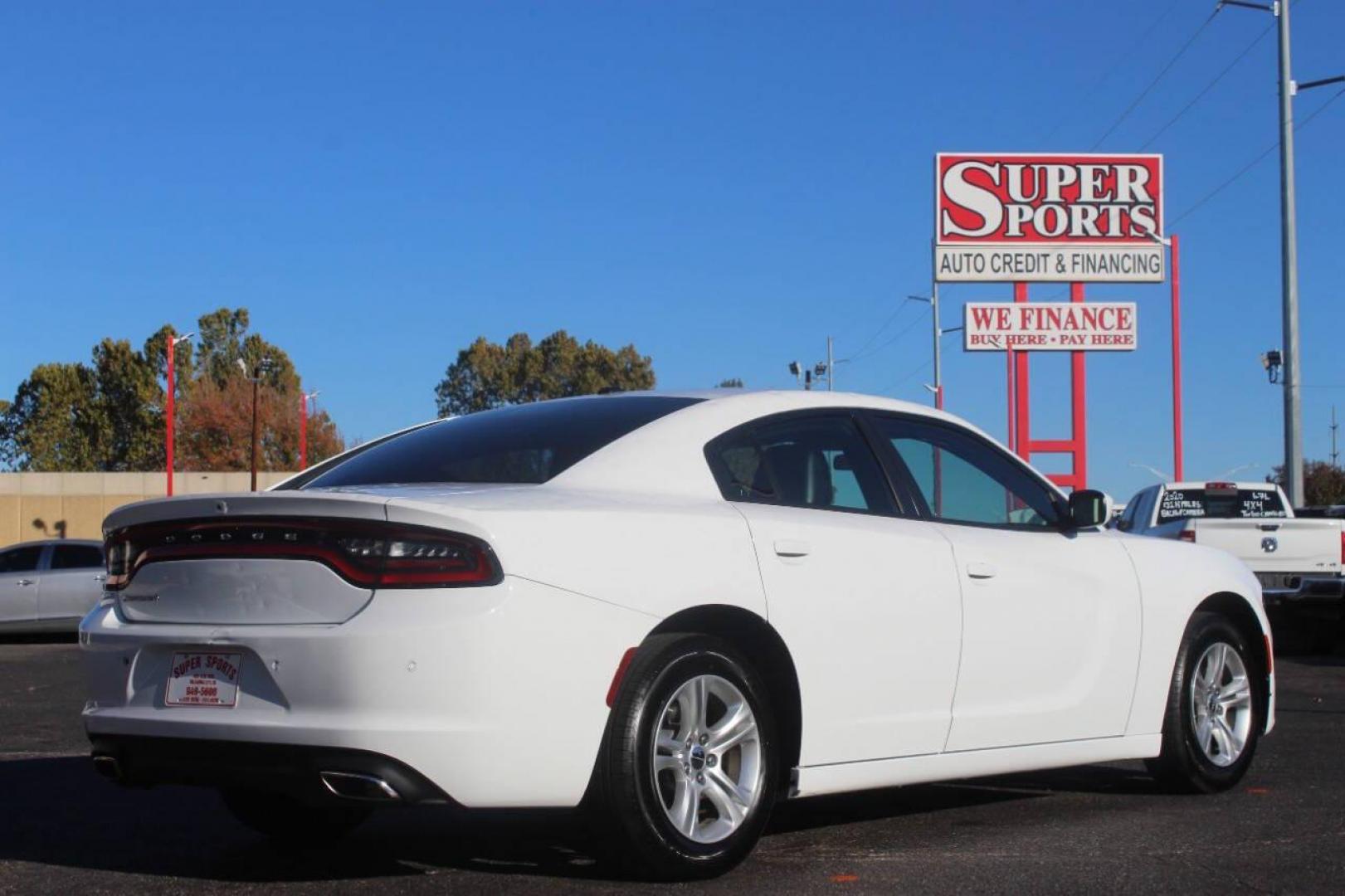 2022 White Dodge Charger SXT (2C3CDXBG6NH) with an 3.6L V6 DOHC 24V engine, 8A transmission, located at 4301 NW 39th , Oklahoma City, OK, 73112, (405) 949-5600, 35.512135, -97.598671 - NO DRIVERS LICENCE NO-FULL COVERAGE INSURANCE-NO CREDIT CHECK. COME ON OVER TO SUPERSPORTS AND TAKE A LOOK AND TEST DRIVE. PLEASE GIVE US A CALL AT (405) 949-5600. NO LICENSIA DE MANEJAR- NO SEGURO DE COBERTURA TOTAL- NO VERIFICACCION DE CREDITO. POR FAVOR VENGAN A SUPERSPORTS, ECHE UN - Photo#4