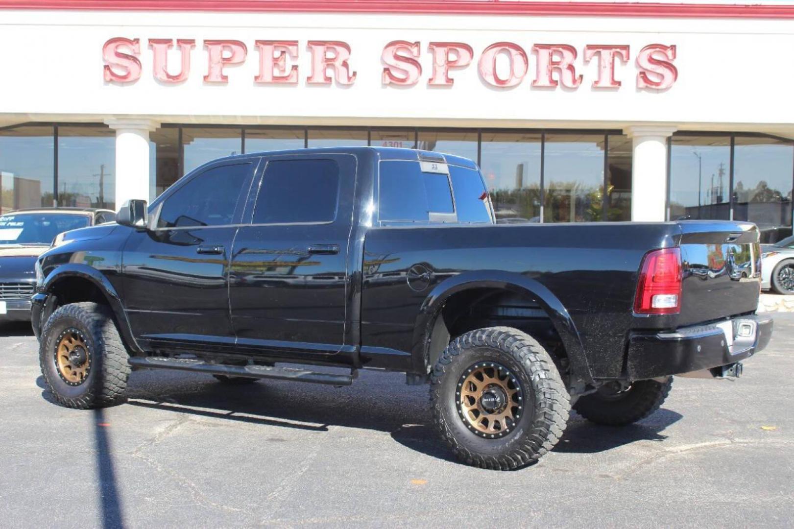 2014 Black RAM 2500 Laramie Crew Cab SWB 4WD (3C6UR5FJ2EG) with an 6.7L L6 engine, 6-Speed Automatic transmission, located at 4301 NW 39th , Oklahoma City, OK, 73112, (405) 949-5600, 35.512135, -97.598671 - NO DRIVERS LICENCE NO-FULL COVERAGE INSURANCE-NO CREDIT CHECK. COME ON OVER TO SUPERSPORTS AND TAKE A LOOK AND TEST DRIVE. PLEASE GIVE US A CALL AT (405) 949-5600. NO LICENSIA DE MANEJAR- NO SEGURO DE COBERTURA TOTAL- NO VERIFICACCION DE CREDITO. POR FAVOR VENGAN A SUPERSPORTS, ECHE UN - Photo#3