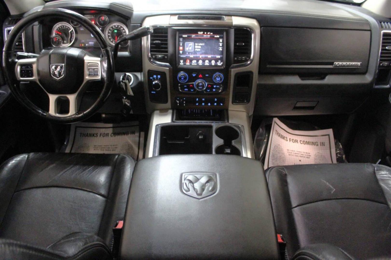 2014 Black RAM 2500 Laramie Crew Cab SWB 4WD (3C6UR5FJ2EG) with an 6.7L L6 engine, 6-Speed Automatic transmission, located at 4301 NW 39th , Oklahoma City, OK, 73112, (405) 949-5600, 35.512135, -97.598671 - NO DRIVERS LICENCE NO-FULL COVERAGE INSURANCE-NO CREDIT CHECK. COME ON OVER TO SUPERSPORTS AND TAKE A LOOK AND TEST DRIVE. PLEASE GIVE US A CALL AT (405) 949-5600. NO LICENSIA DE MANEJAR- NO SEGURO DE COBERTURA TOTAL- NO VERIFICACCION DE CREDITO. POR FAVOR VENGAN A SUPERSPORTS, ECHE UN - Photo#16