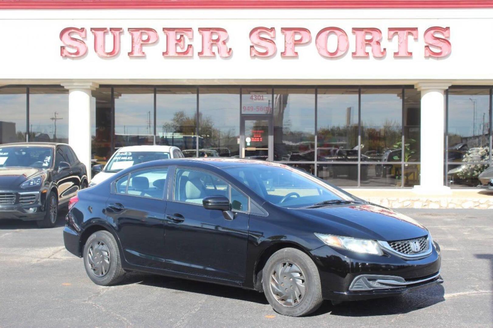 2015 Black Honda Civic LX Sedan CVT (19XFB2F57FE) with an 1.8L L4 SOHC 16V engine, Continuously Variable Transmission transmission, located at 4301 NW 39th , Oklahoma City, OK, 73112, (405) 949-5600, 35.512135, -97.598671 - NO DRIVERS LICENCE NO-FULL COVERAGE INSURANCE-NO CREDIT CHECK. COME ON OVER TO SUPERSPORTS AND TAKE A LOOK AND TEST DRIVE. PLEASE GIVE US A CALL AT (405) 949-5600. NO LICENSIA DE MANEJAR- NO SEGURO DE COBERTURA TOTAL- NO VERIFICACCION DE CREDITO. POR FAVOR VENGAN A SUPERSPORTS, ECHE UN - Photo#2