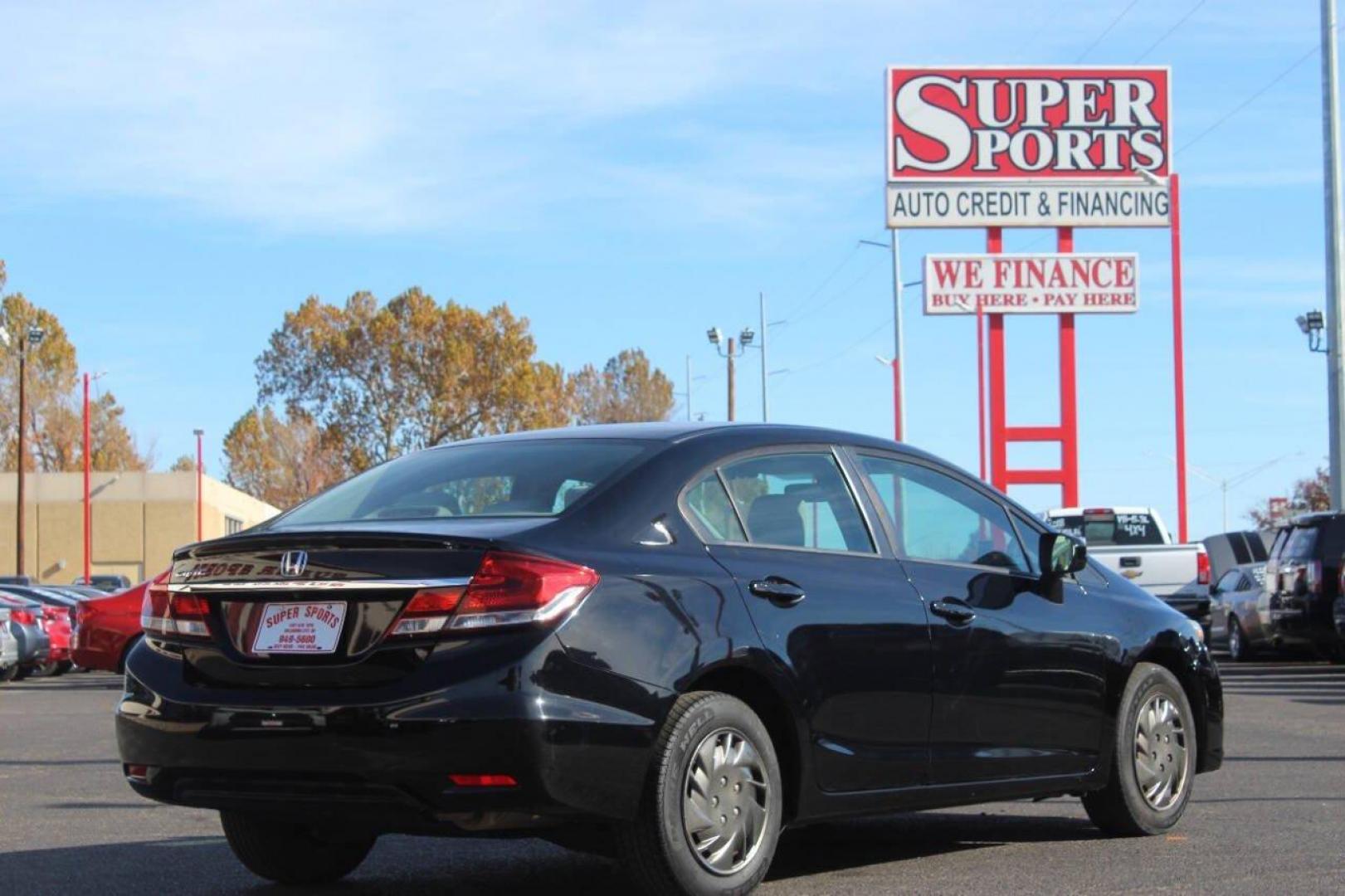2015 Black Honda Civic LX Sedan CVT (19XFB2F57FE) with an 1.8L L4 SOHC 16V engine, Continuously Variable Transmission transmission, located at 4301 NW 39th , Oklahoma City, OK, 73112, (405) 949-5600, 35.512135, -97.598671 - NO DRIVERS LICENCE NO-FULL COVERAGE INSURANCE-NO CREDIT CHECK. COME ON OVER TO SUPERSPORTS AND TAKE A LOOK AND TEST DRIVE. PLEASE GIVE US A CALL AT (405) 949-5600. NO LICENSIA DE MANEJAR- NO SEGURO DE COBERTURA TOTAL- NO VERIFICACCION DE CREDITO. POR FAVOR VENGAN A SUPERSPORTS, ECHE UN - Photo#4