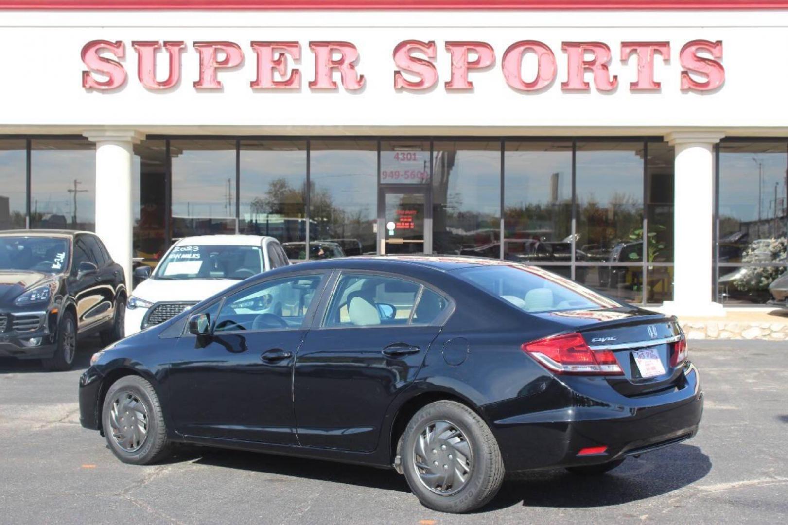 2015 Black Honda Civic LX Sedan CVT (19XFB2F57FE) with an 1.8L L4 SOHC 16V engine, Continuously Variable Transmission transmission, located at 4301 NW 39th , Oklahoma City, OK, 73112, (405) 949-5600, 35.512135, -97.598671 - NO DRIVERS LICENCE NO-FULL COVERAGE INSURANCE-NO CREDIT CHECK. COME ON OVER TO SUPERSPORTS AND TAKE A LOOK AND TEST DRIVE. PLEASE GIVE US A CALL AT (405) 949-5600. NO LICENSIA DE MANEJAR- NO SEGURO DE COBERTURA TOTAL- NO VERIFICACCION DE CREDITO. POR FAVOR VENGAN A SUPERSPORTS, ECHE UN - Photo#5