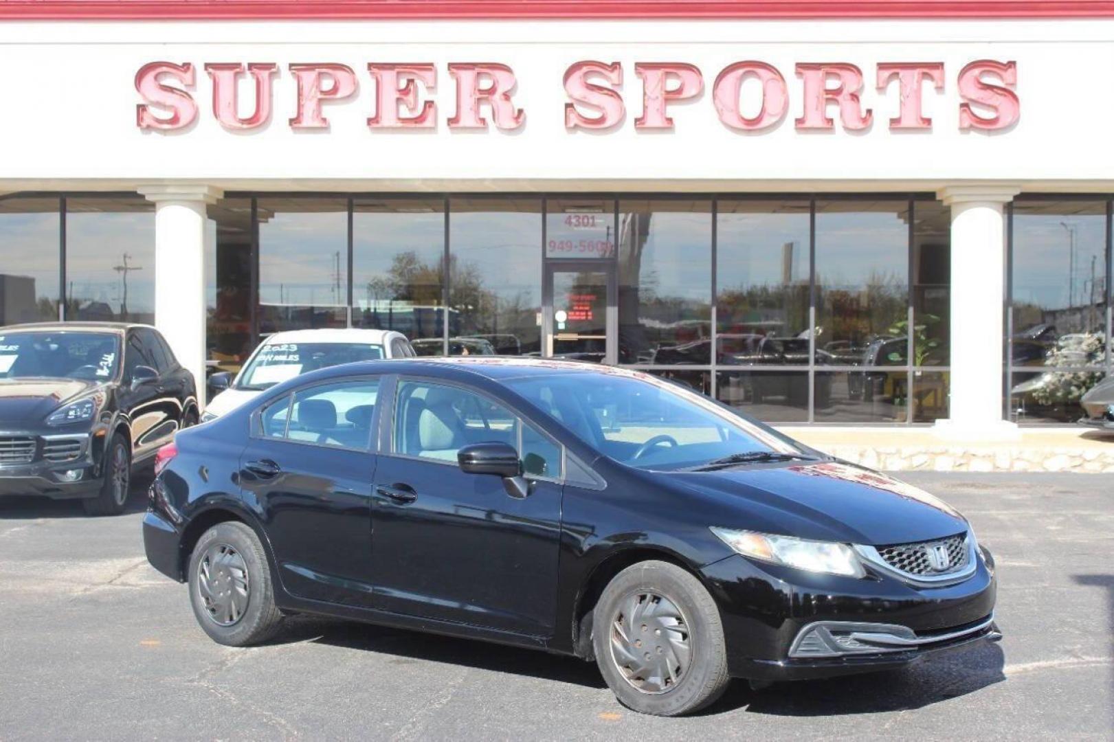2015 Black Honda Civic LX Sedan CVT (19XFB2F57FE) with an 1.8L L4 SOHC 16V engine, Continuously Variable Transmission transmission, located at 4301 NW 39th , Oklahoma City, OK, 73112, (405) 949-5600, 35.512135, -97.598671 - NO DRIVERS LICENCE -NO FULL COVERAGE INSURANCE - NO CREDIT CHECK. COME ON OVER TO SUPERSPORTS, TAKE A LOOK AND TEST DRIVE. PLEASE GIVE US A CALL AT (405) 949-5600. NO LICENCIA DE CONDUCIR - NO SEGURO DE COBERTURA TOTAL - NO VERIFICACION DE CREDITO. VISITENOS EN SUPERSPORTS, MIRE NUESTRO - Photo#2