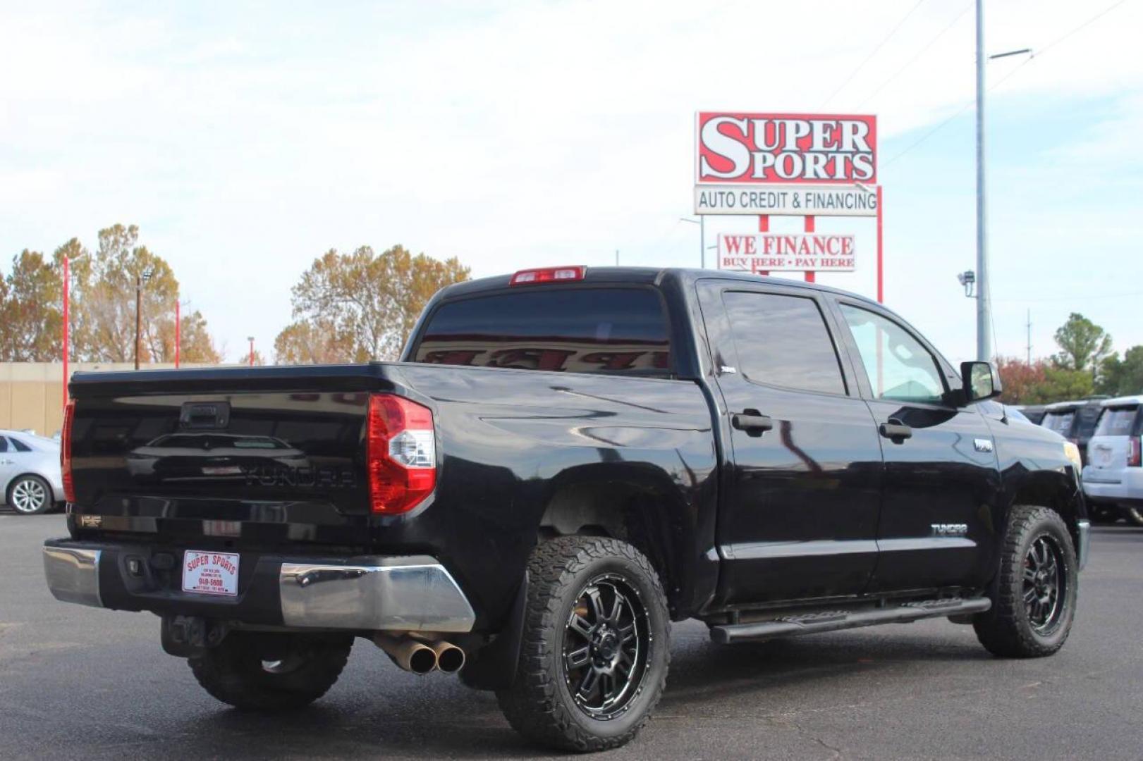 2014 Black Toyota Tundra SR5 5.7L V8 CrewMax 2WD (5TFEY5F11EX) with an 5.7L V8 DOHC 32V engine, 6-Speed Automatic transmission, located at 4301 NW 39th , Oklahoma City, OK, 73112, (405) 949-5600, 35.512135, -97.598671 - NO DRIVERS LICENCE NO-FULL COVERAGE INSURANCE-NO CREDIT CHECK. COME ON OVER TO SUPERSPORTS AND TAKE A LOOK AND TEST DRIVE. PLEASE GIVE US A CALL AT (405) 949-5600. NO LICENSIA DE MANEJAR- NO SEGURO DE COBERTURA TOTAL- NO VERIFICACCION DE CREDITO. POR FAVOR VENGAN A SUPERSPORTS, ECHE UN - Photo#4