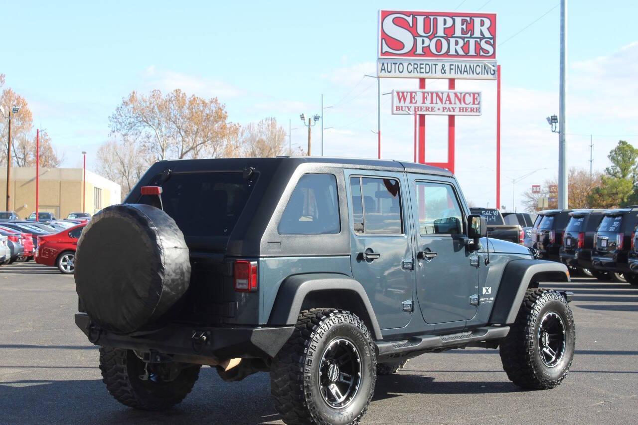 2008 Gray Jeep Wrangler Unlimited X 4WD (1J4GA39138L) with an 3.8L V6 OHV 12V engine, Automatic 4-Speed transmission, located at 4301 NW 39th , Oklahoma City, OK, 73112, (405) 949-5600, 35.512135, -97.598671 - NO DRIVERS LICENCE -NO FULL COVERAGE INSURANCE - NO CREDIT CHECK. COME ON OVER TO SUPERSPORTS, TAKE A LOOK AND TEST DRIVE. PLEASE GIVE US A CALL AT (405) 949-5600. NO LICENCIA DE CONDUCIR - NO SEGURO DE COBERTURA TOTAL - NO VERIFICACION DE CREDITO. VISITENOS EN SUPERSPORTS, MIRE NUESTRO - Photo#3