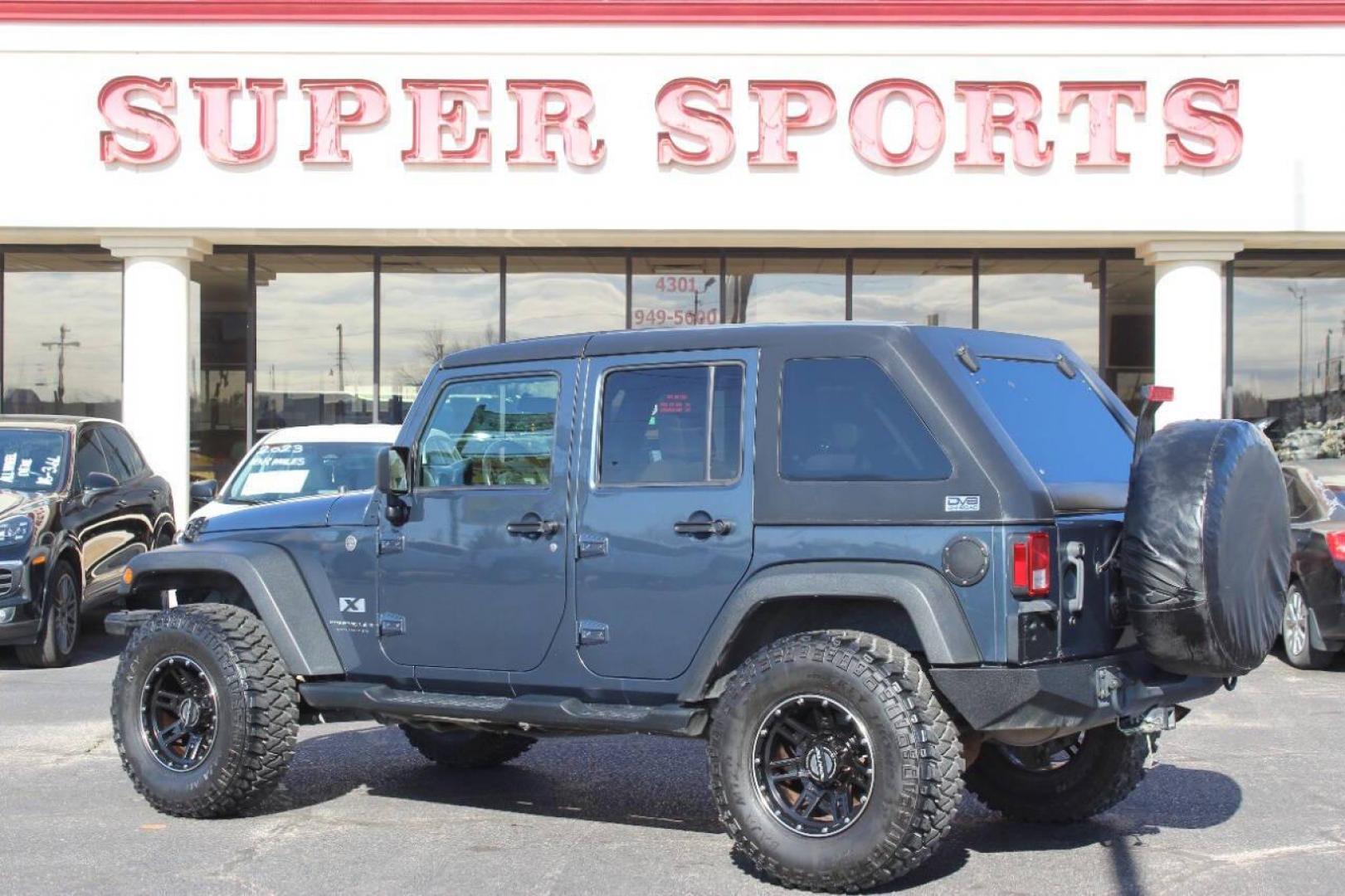 2008 Blue Jeep Wrangler Unlimited X 4WD (1J4GA39138L) with an 3.8L V6 OHV 12V engine, Automatic 4-Speed transmission, located at 4301 NW 39th , Oklahoma City, OK, 73112, (405) 949-5600, 35.512135, -97.598671 - NO DRIVERS LICENCE NO-FULL COVERAGE INSURANCE-NO CREDIT CHECK. COME ON OVER TO SUPERSPORTS AND TAKE A LOOK AND TEST DRIVE. PLEASE GIVE US A CALL AT (405) 949-5600. NO LICENSIA DE MANEJAR- NO SEGURO DE COBERTURA TOTAL- NO VERIFICACCION DE CREDITO. POR FAVOR VENGAN A SUPERSPORTS, ECHE UN - Photo#6