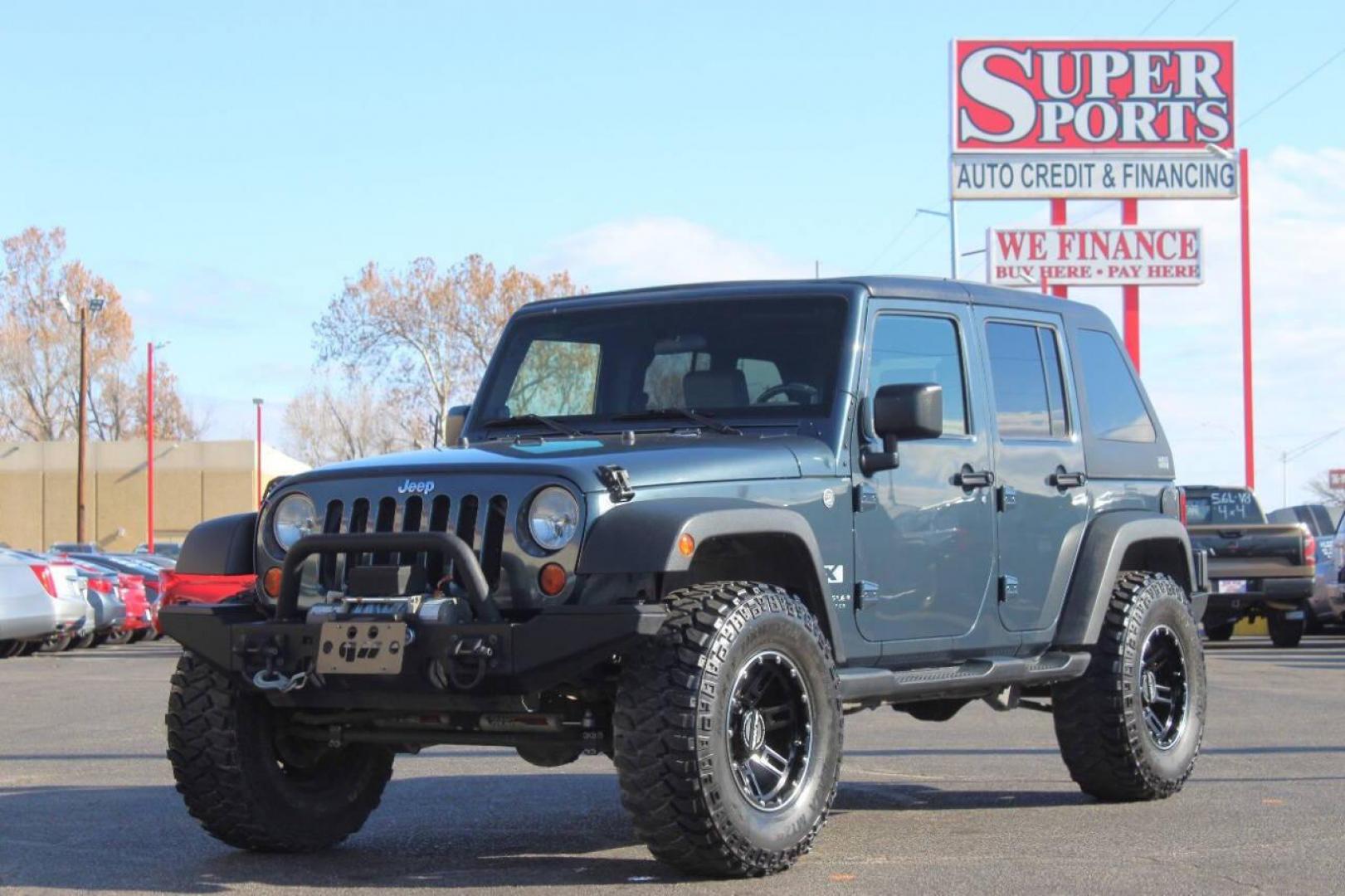 2008 Blue Jeep Wrangler Unlimited X 4WD (1J4GA39138L) with an 3.8L V6 OHV 12V engine, Automatic 4-Speed transmission, located at 4301 NW 39th , Oklahoma City, OK, 73112, (405) 949-5600, 35.512135, -97.598671 - NO DRIVERS LICENCE NO-FULL COVERAGE INSURANCE-NO CREDIT CHECK. COME ON OVER TO SUPERSPORTS AND TAKE A LOOK AND TEST DRIVE. PLEASE GIVE US A CALL AT (405) 949-5600. NO LICENSIA DE MANEJAR- NO SEGURO DE COBERTURA TOTAL- NO VERIFICACCION DE CREDITO. POR FAVOR VENGAN A SUPERSPORTS, ECHE UN - Photo#8