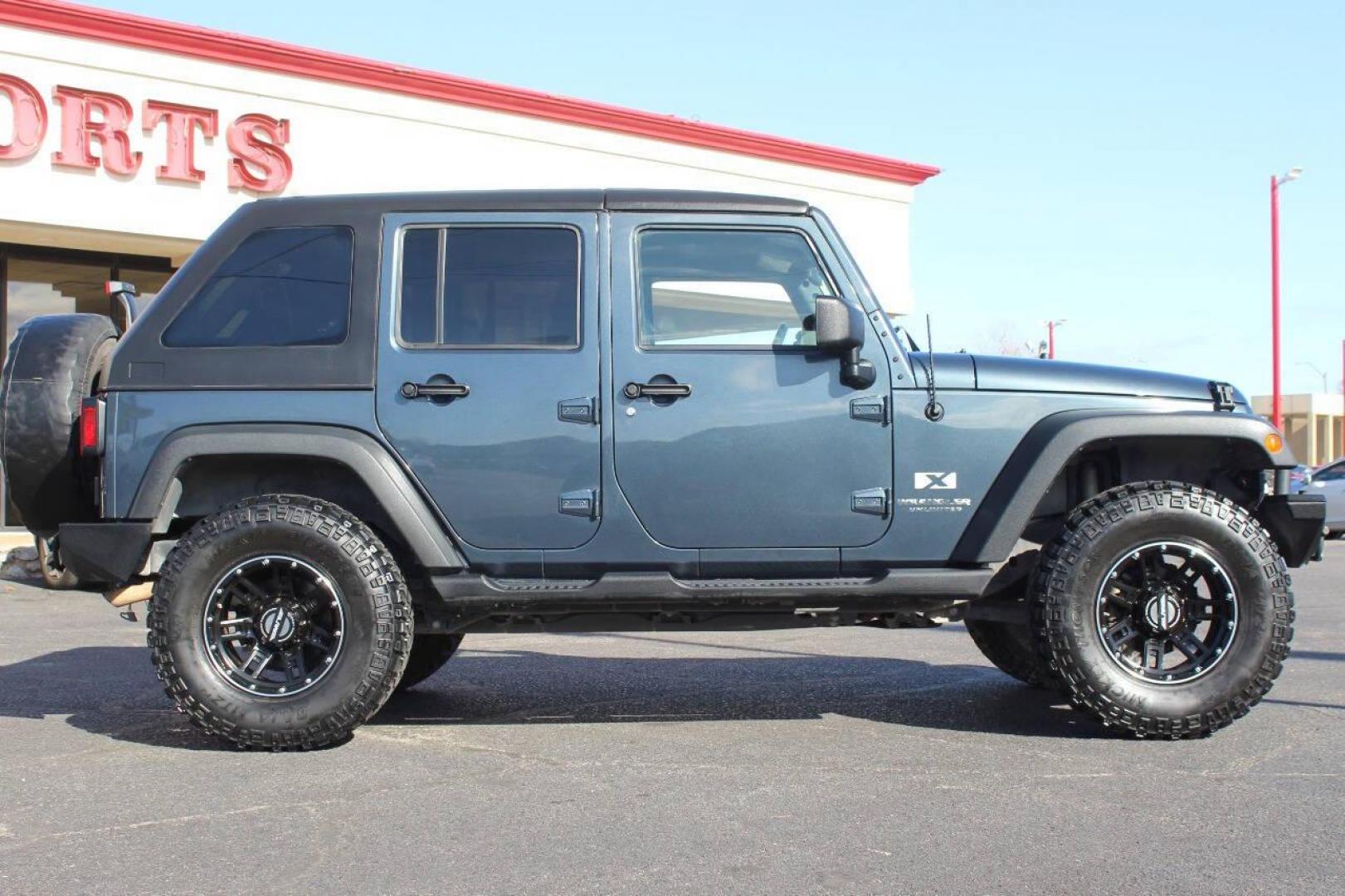 2008 Blue Jeep Wrangler Unlimited X 4WD (1J4GA39138L) with an 3.8L V6 OHV 12V engine, Automatic 4-Speed transmission, located at 4301 NW 39th , Oklahoma City, OK, 73112, (405) 949-5600, 35.512135, -97.598671 - NO DRIVERS LICENCE NO-FULL COVERAGE INSURANCE-NO CREDIT CHECK. COME ON OVER TO SUPERSPORTS AND TAKE A LOOK AND TEST DRIVE. PLEASE GIVE US A CALL AT (405) 949-5600. NO LICENSIA DE MANEJAR- NO SEGURO DE COBERTURA TOTAL- NO VERIFICACCION DE CREDITO. POR FAVOR VENGAN A SUPERSPORTS, ECHE UN - Photo#3