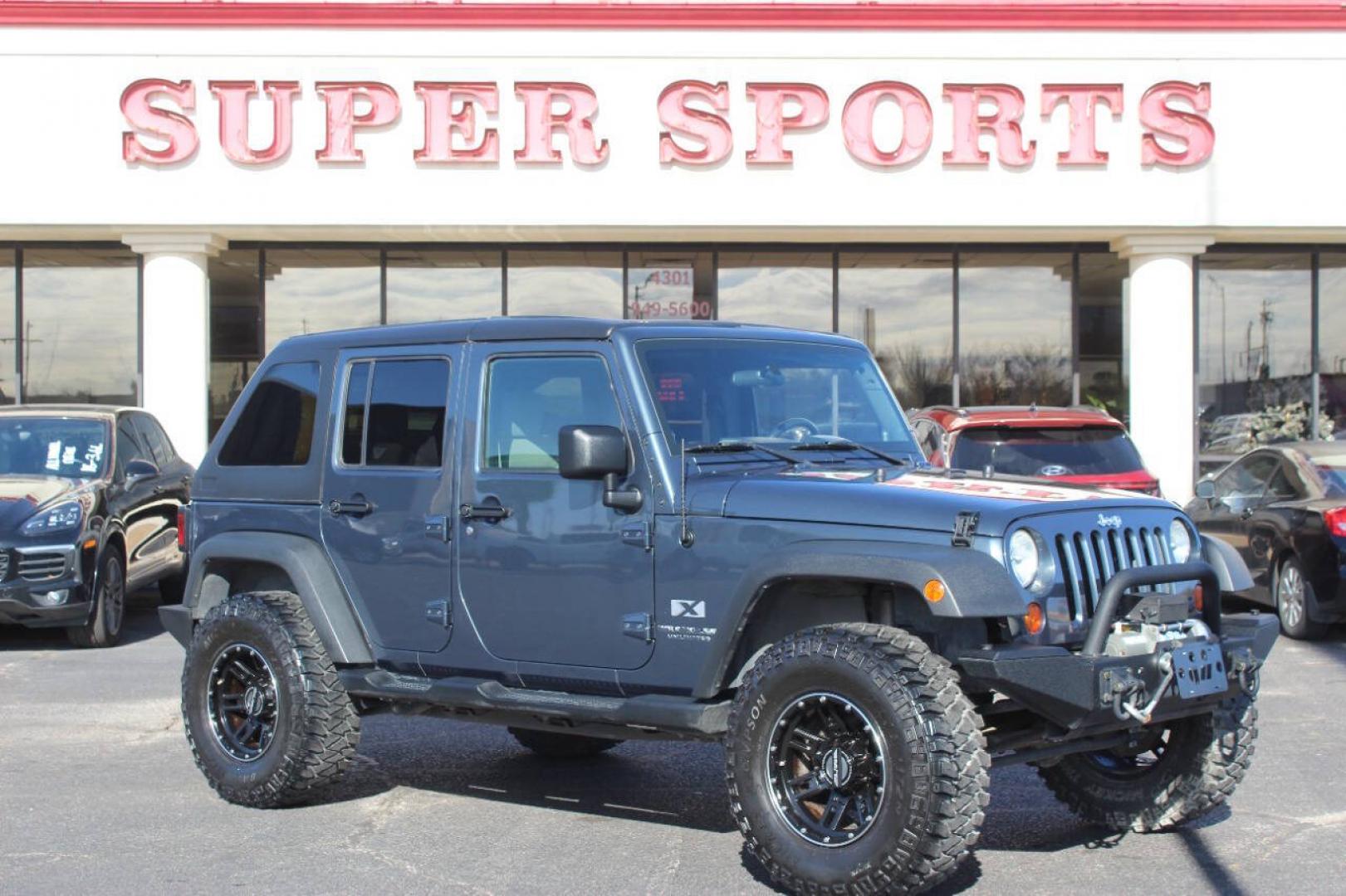 2008 Gray Jeep Wrangler Unlimited Unlimited X 4WD (1J4GA39138L) with an 3.8L V6 3.8L V6 engine, Automatic 4-Speed transmission, located at 4301 NW 39th , Oklahoma City, OK, 73112, (405) 949-5600, 35.512135, -97.598671 - NO DRIVERS LICENCE -NO FULL COVERAGE INSURANCE - NO CREDIT CHECK. COME ON OVER TO SUPERSPORTS, TAKE A LOOK AND TEST DRIVE. PLEASE GIVE US A CALL AT (405) 949-5600. NO LICENCIA DE CONDUCIR - NO SEGURO DE COBERTURA TOTAL - NO VERIFICACION DE CREDITO. VISITENOS EN SUPERSPORTS, MIRE NUESTRO- Photo#0
